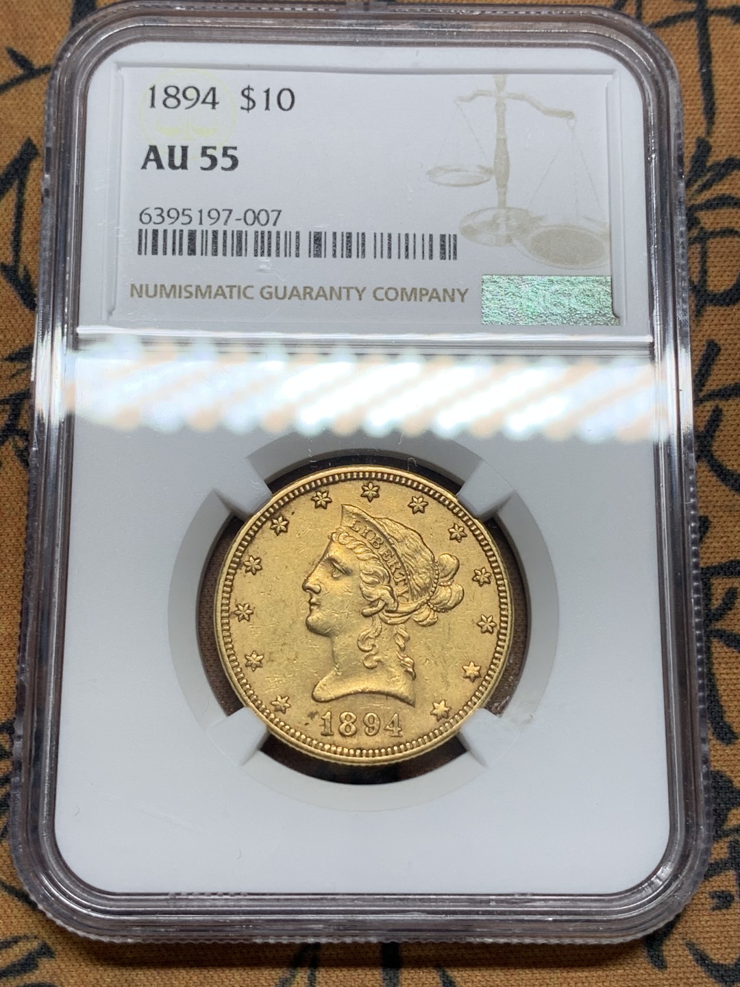 《竞宝斋》第96场-本周日，周一，周四，3场连拍（全场不限金额包邮） NGC-AU55 美国1894年 自由女神像 10美元金币 16.72克 早期年份 好品较少