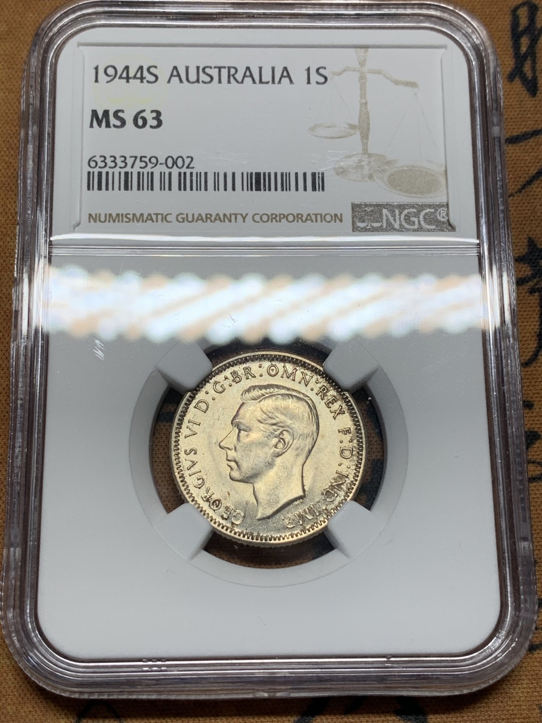 《竞宝斋》第96场-本周日，周一，周四，3场连拍（全场不限金额包邮） NGC MS63 澳大利亚 1944年 乔治六世 绵羊 1先令 银币 暴光状态