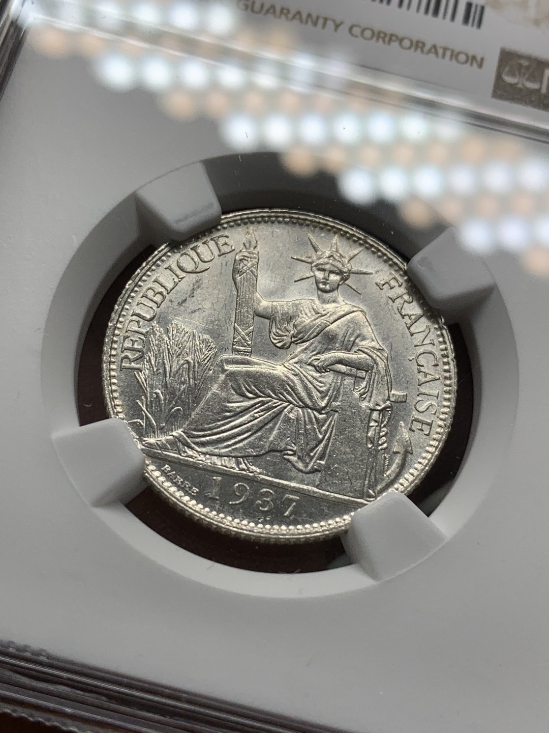 《竞宝斋》第96场-本周日，周一，周四，3场连拍（全场不限金额包邮） NGC-MS61 法属印支 1937年坐洋2角银币  卷拆曝光品相