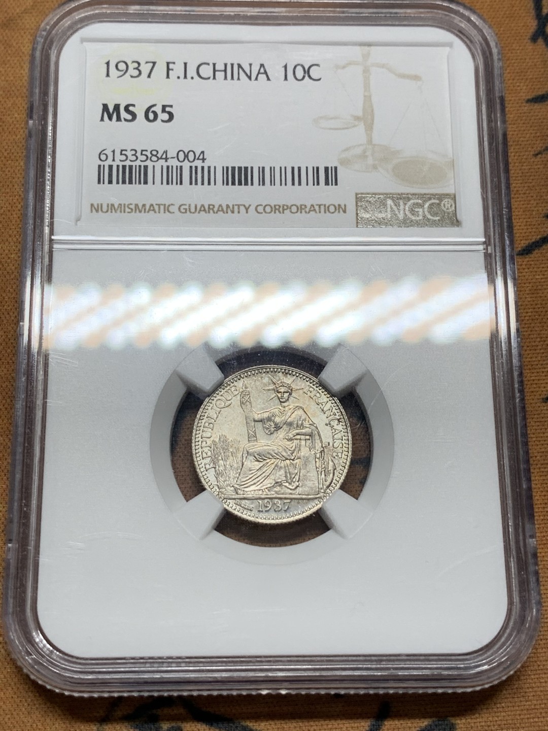 《竞宝斋》第96场-本周日，周一，周四，3场连拍（全场不限金额包邮） 季军分 NGC MS65 法属印度支那1937年10分银币