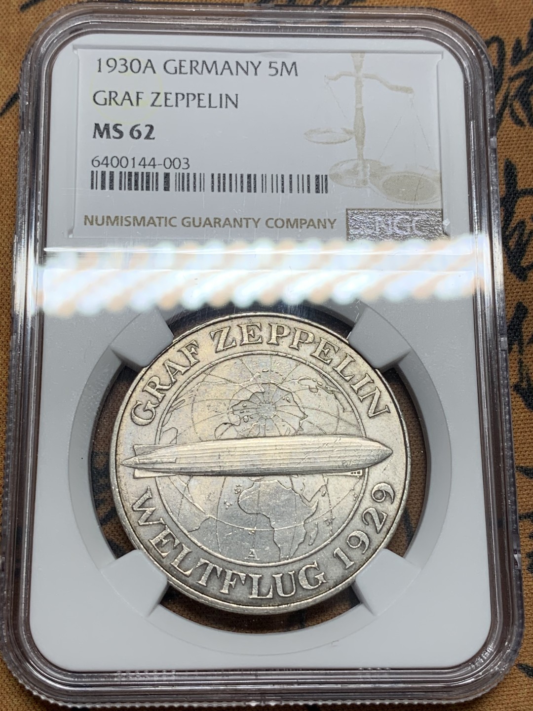 《竞宝斋》第96场-本周日，周一，周四，3场连拍（全场不限金额包邮） NGC MS62 德国 1930年 齐柏林飞艇5马克，带转光  首见品种