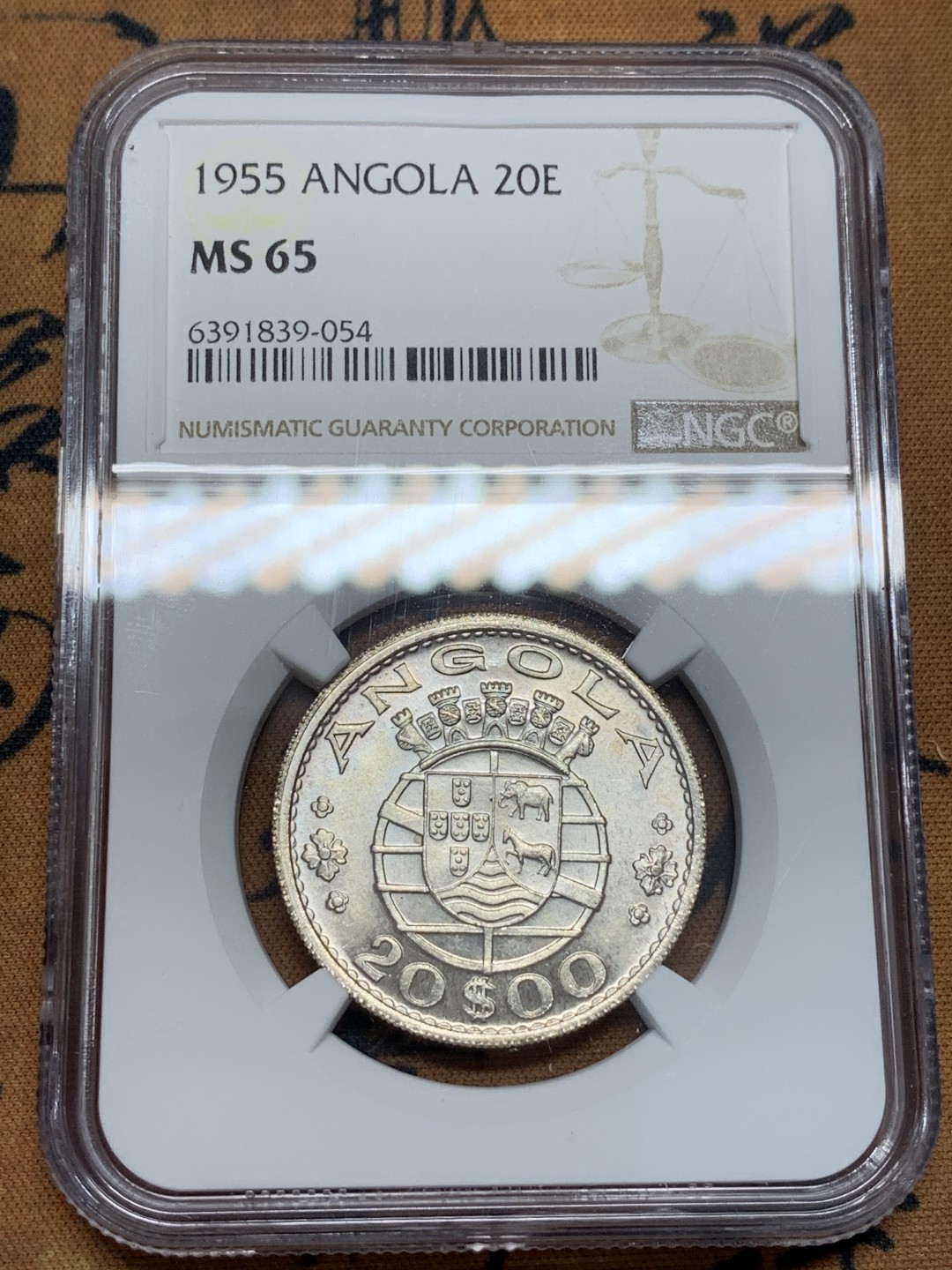 《竞宝斋》第96场-本周日，周一，周四，3场连拍（全场不限金额包邮） NGC MS65 葡属安哥拉1955年20埃斯库多银币 高分好品