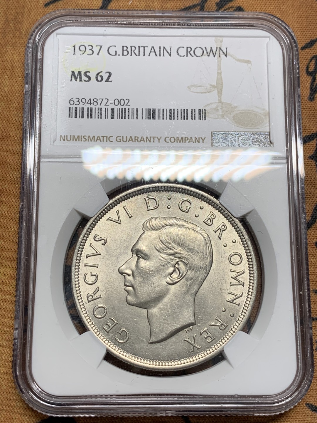 《竞宝斋》第96场-本周日，周一，周四，3场连拍（全场不限金额包邮） NGC-MS62 英国 1937年乔治六世一克朗银币 转光好品