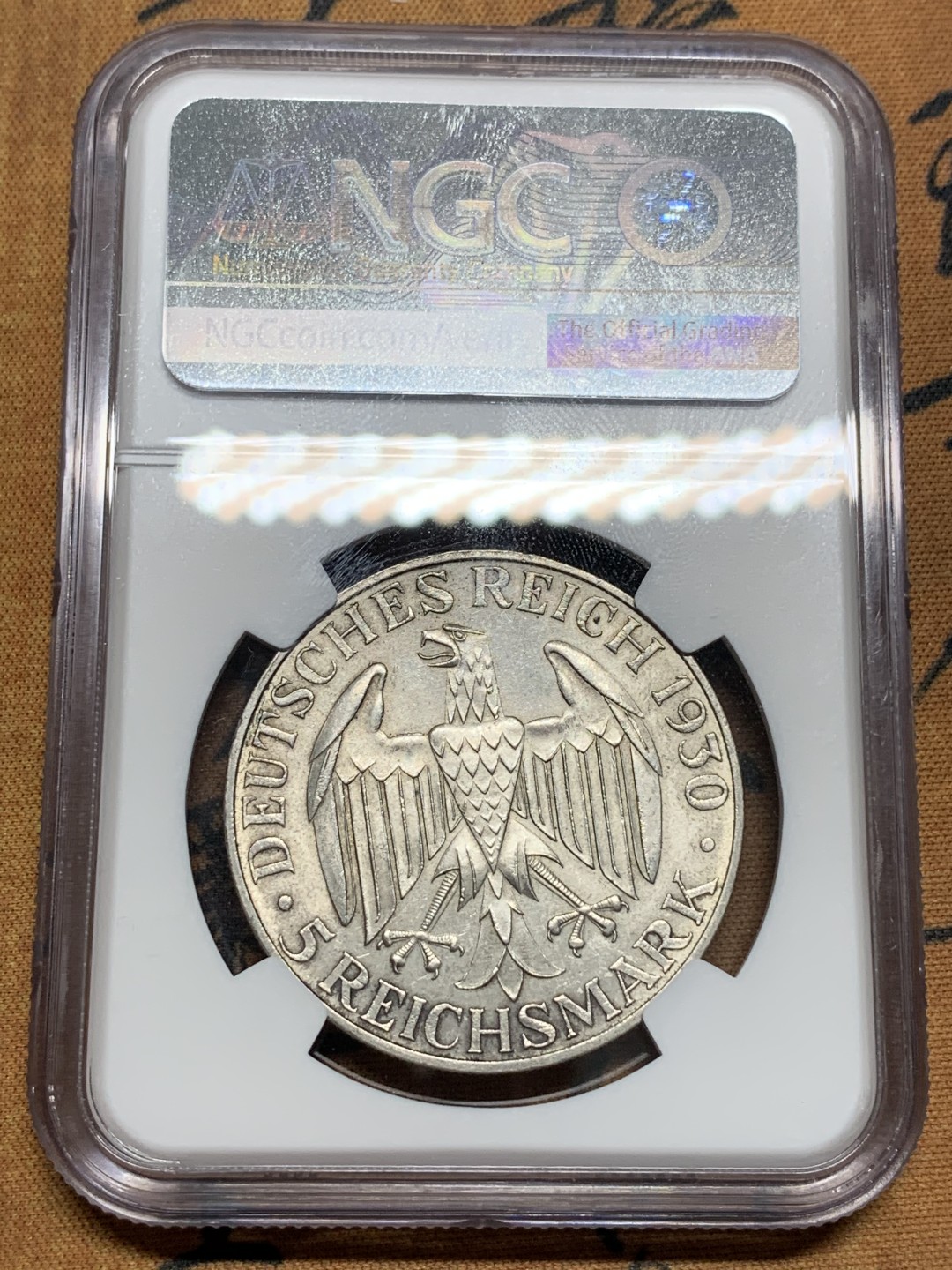 《竞宝斋》第96场-本周日，周一，周四，3场连拍（全场不限金额包邮） NGC MS62 德国 1930年 齐柏林飞艇5马克，带转光  首见品种