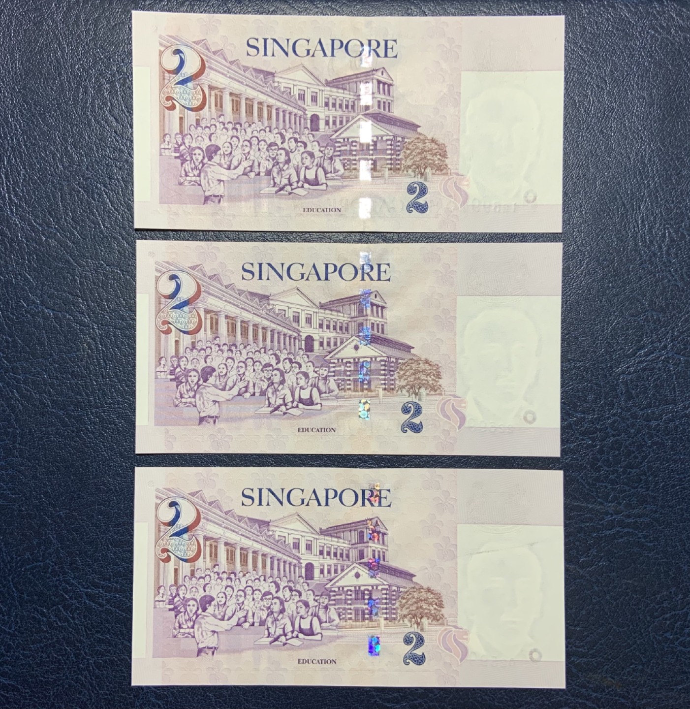 收藏联盟Quantum Auction 第193期拍卖(已更新) 新加坡2000年2元千禧龙年尾六同三张 品相全新UNC 带原装纪念册