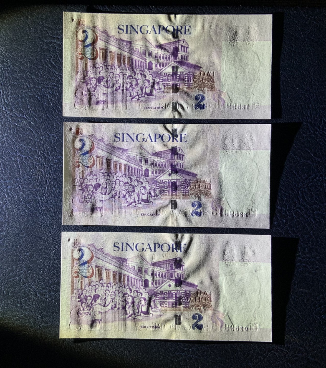 收藏联盟Quantum Auction 第193期拍卖(已更新) 新加坡2000年2元千禧龙年尾六同三张 品相全新UNC 带原装纪念册