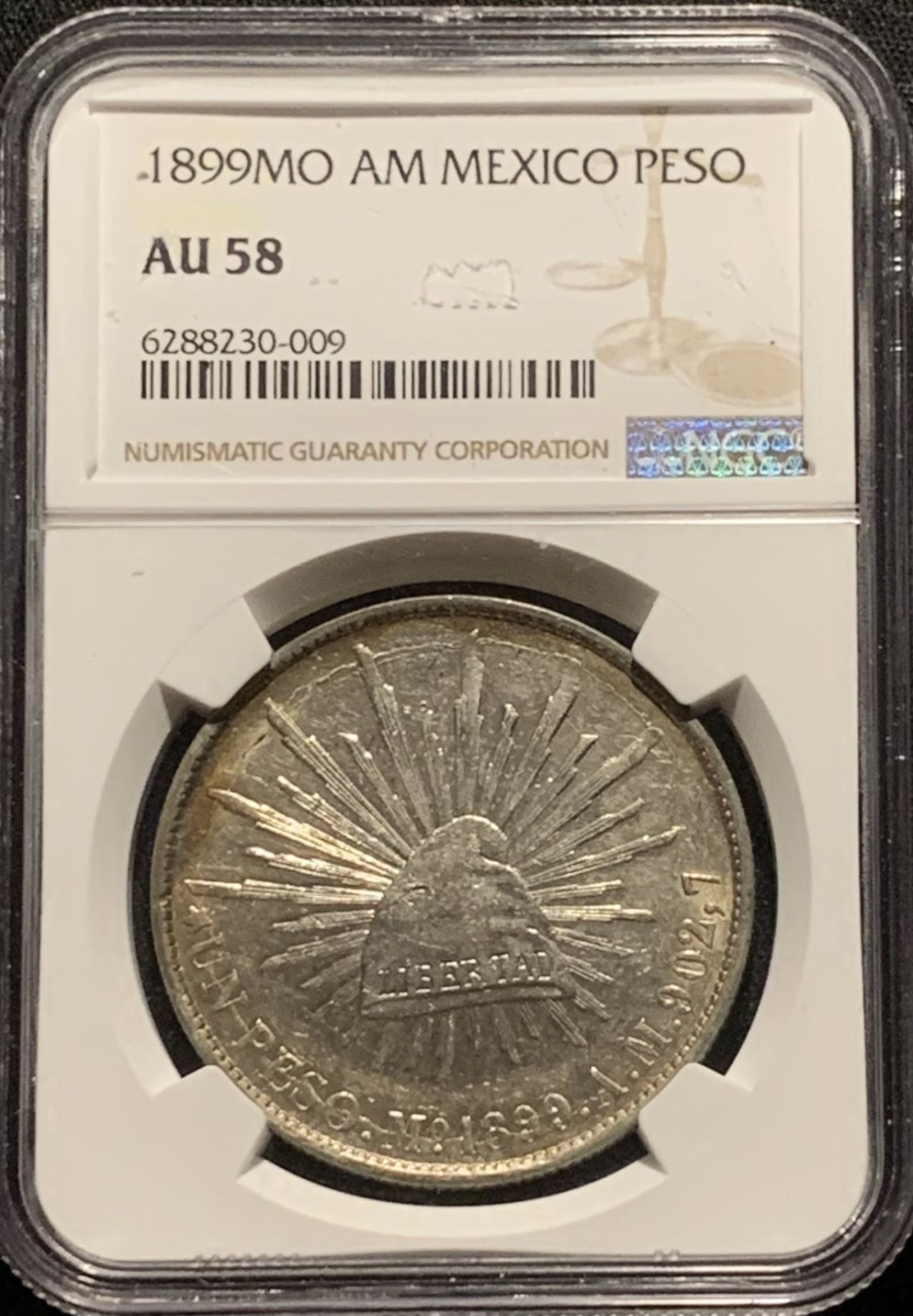 紫瑗钱币——第273期拍卖 墨西哥 1899年 MO AM 在华流通 直边鹰洋 1比索 银币 NGC AU58 五彩包浆