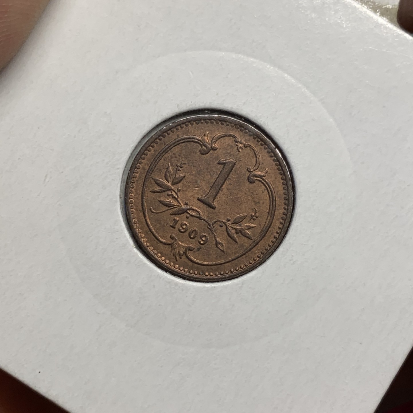 《竞宝斋》第98场-本周日，周一2场连拍（全场不限金额包邮） 奥匈帝国 1909 1赫勒  UNC品相 带灯塔纸夹