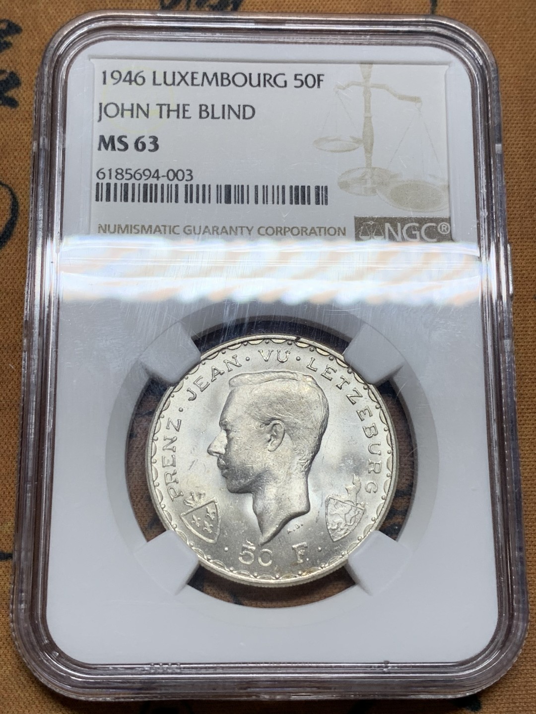 《竞宝斋》第98场-本周日，周一2场连拍（全场不限金额包邮） NGC-MS63 卢森堡 1946年 约翰 50法郎 银币 马剑 深打 品相很好 NGC给分保守了