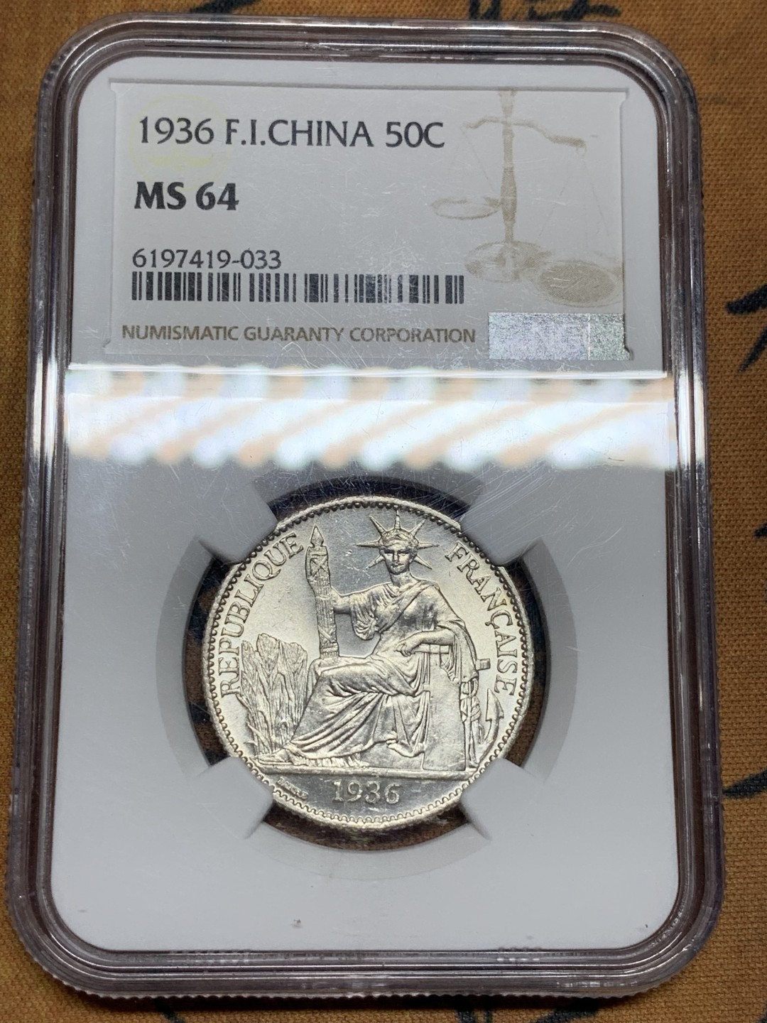 《竞宝斋》第98场-本周日，周一2场连拍（全场不限金额包邮） NGC MS64 法属印支 1936年 坐洋 50分 银币 难得状态