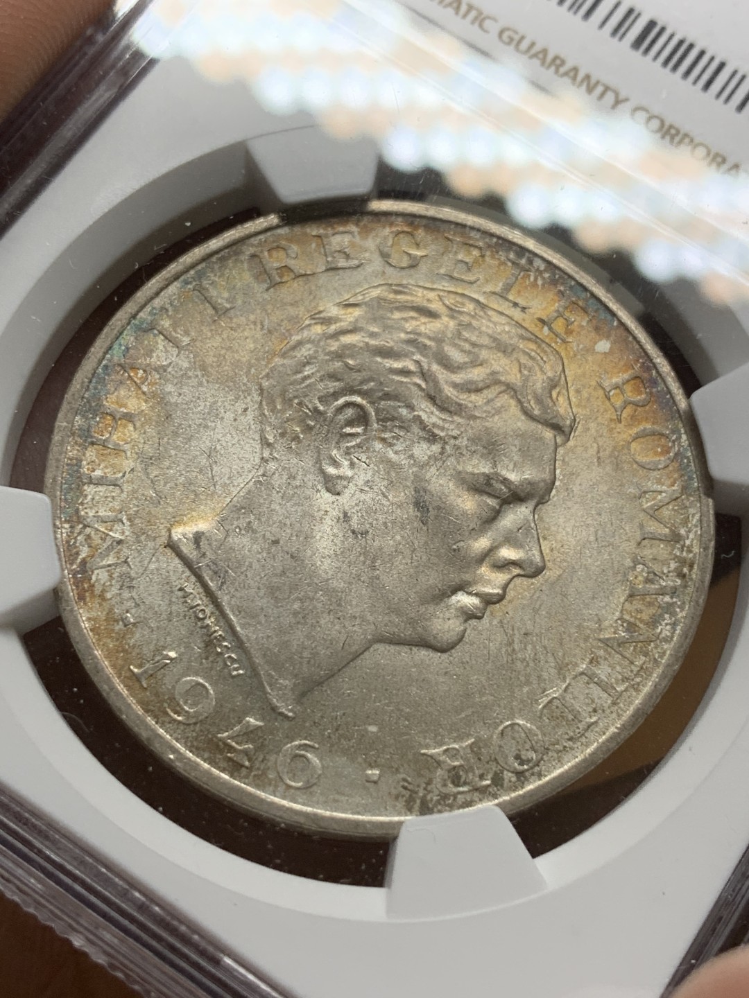 《竞宝斋》第98场-本周日，周一2场连拍（全场不限金额包邮） NGC-MS62 罗马尼亚1946年 100000列伊大银币 原光带金彩 非常漂亮