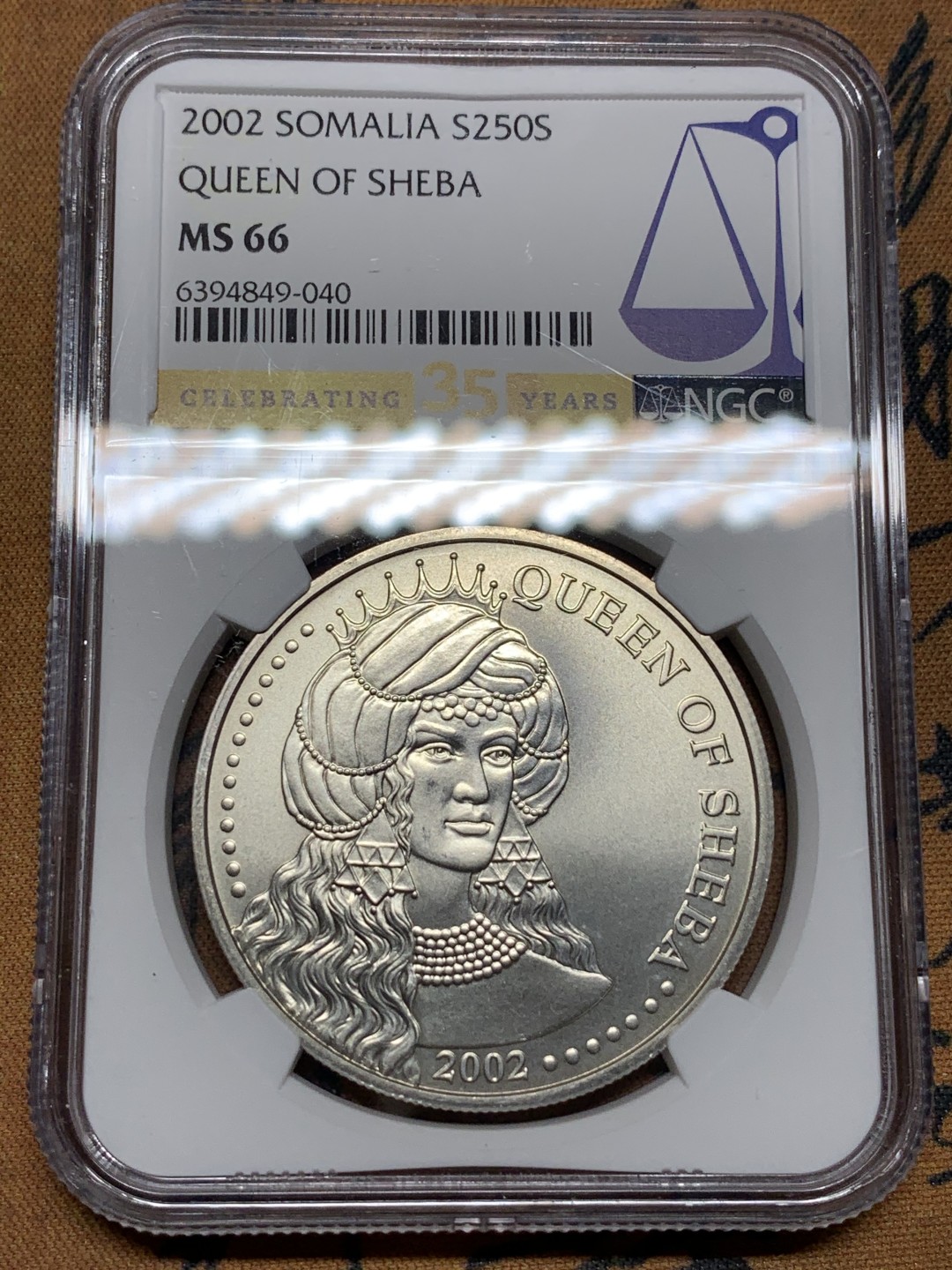 《竞宝斋》第98场-本周日，周一2场连拍（全场不限金额包邮） NGC MS66 索马里 2002年示巴女王大银币，稀见！强光好品，35周年标签