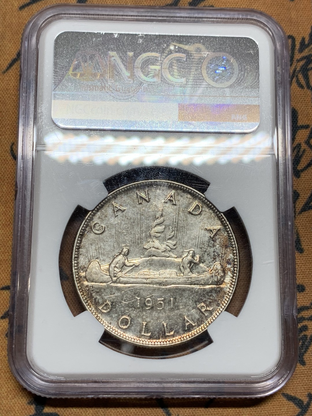 《竞宝斋》第98场-本周日，周一2场连拍（全场不限金额包邮） NGC-MS62 加拿大 1951年经典划船银币 1元银币 淡彩包浆 