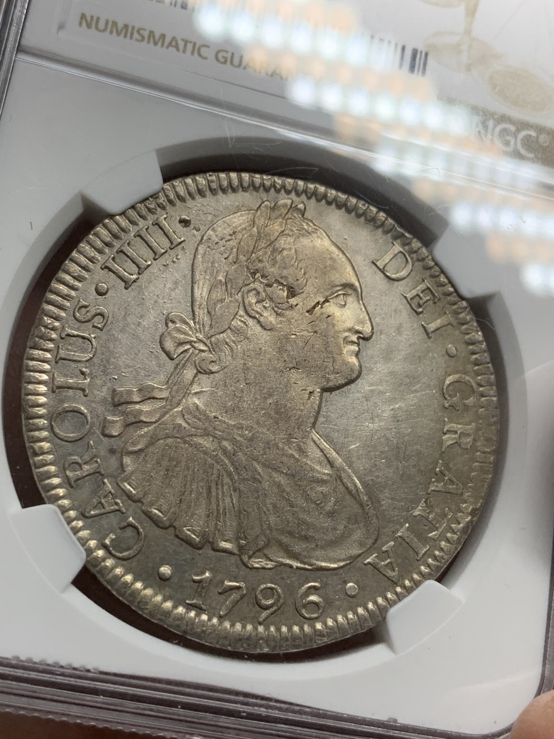 《竞宝斋》第98场-本周日，周一2场连拍（全场不限金额包邮） NGC AU评级 墨西哥 1796年 卡四 早期 8R 双柱大银币深打 细节不错