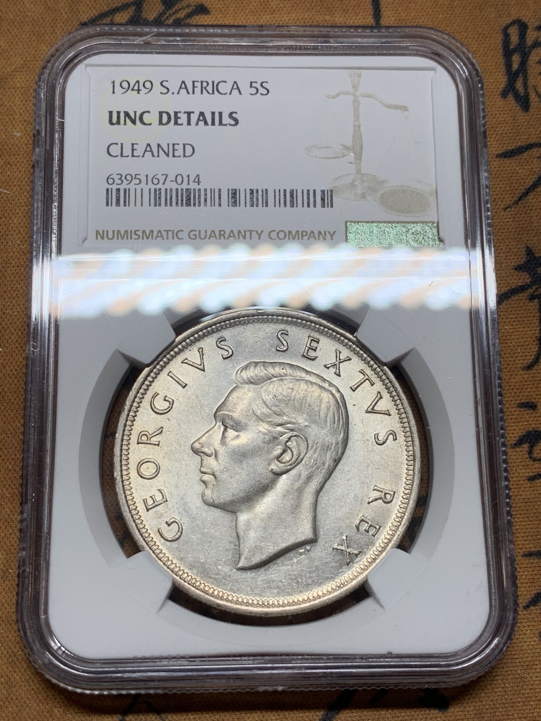 《竞宝斋》第98场-本周日，周一2场连拍（全场不限金额包邮） NGC-UNC 南非1949年 乔六5先令大银币 高银版 28.2克 80%银