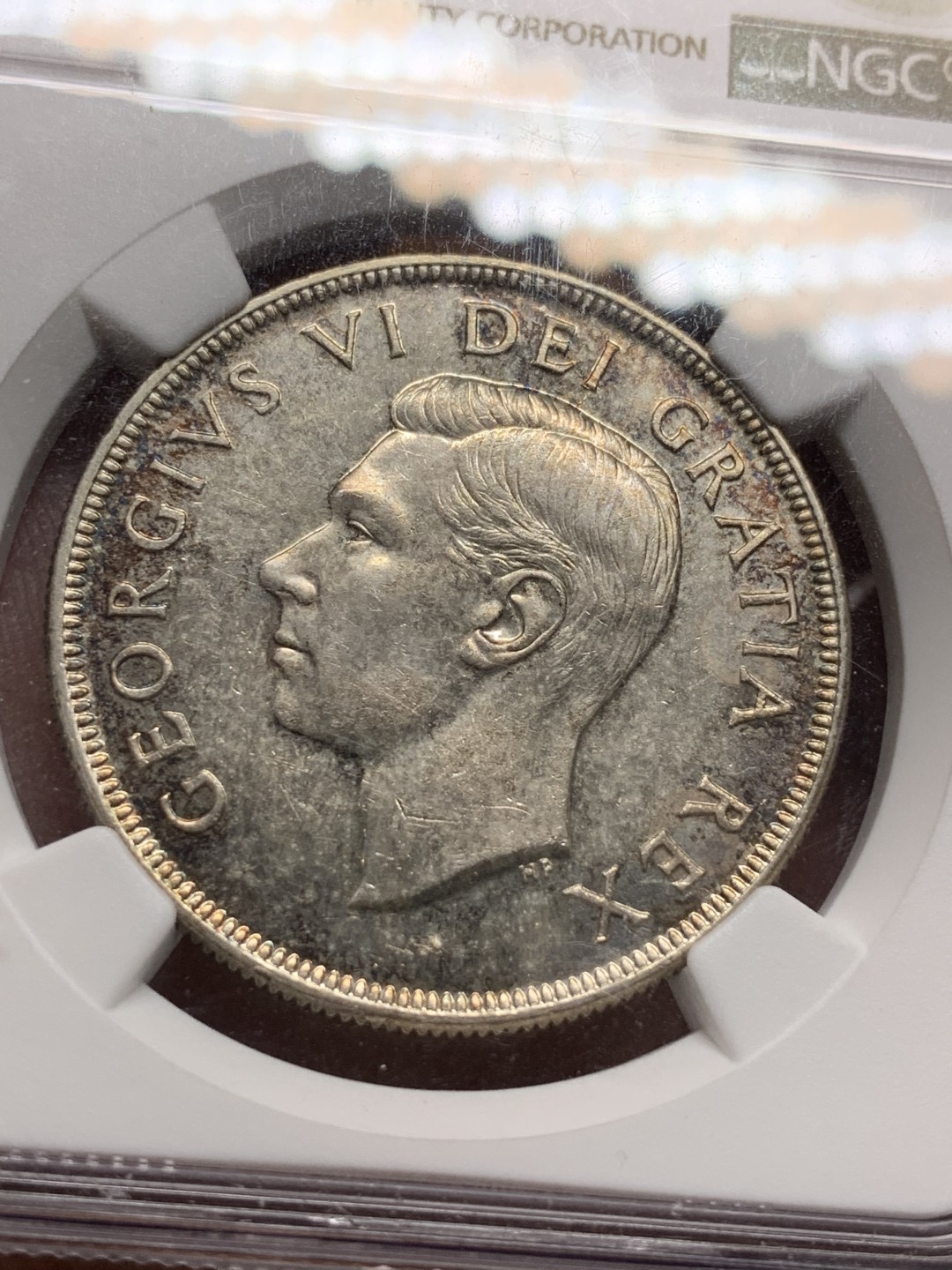 《竞宝斋》第98场-本周日，周一2场连拍（全场不限金额包邮） NGC-MS62 加拿大 1951年经典划船银币 1元银币 淡彩包浆 