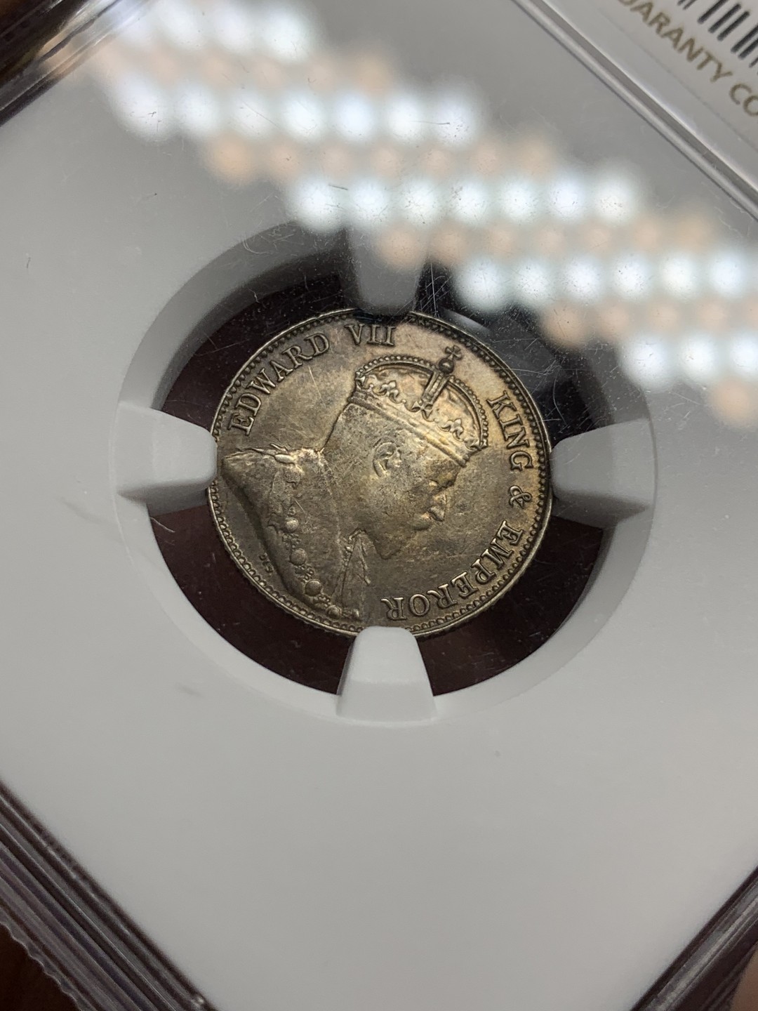 《竞宝斋》第98场-本周日，周一2场连拍（全场不限金额包邮） NGC AU评级 香港 1902年 爱七 10C 1毫银币 细节不错