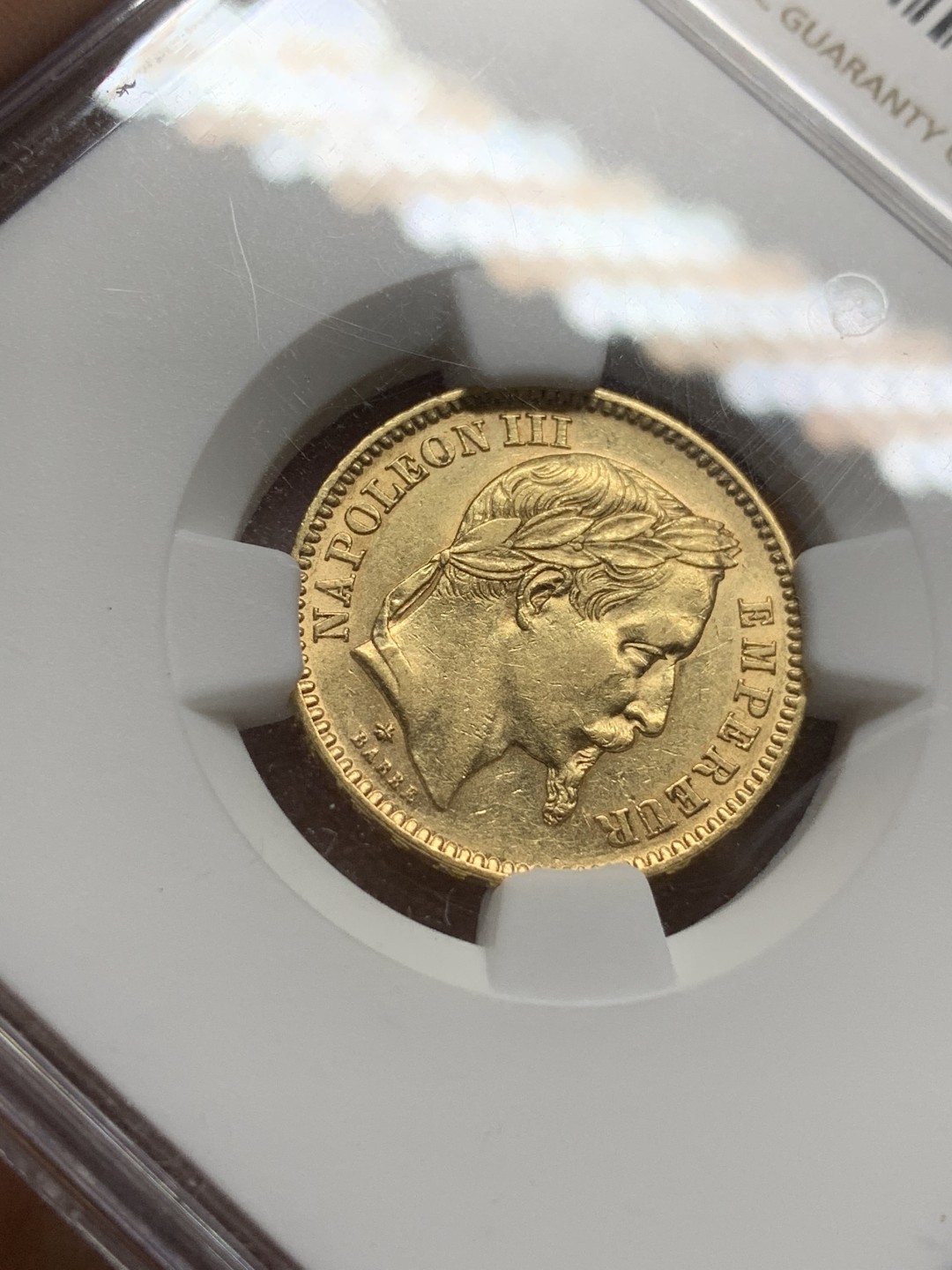 《竞宝斋》第98场-本周日，周一2场连拍（全场不限金额包邮） NGC-AU58 1862年法国拿破仑三世20法郎金币 光度和高点都不错的小金币