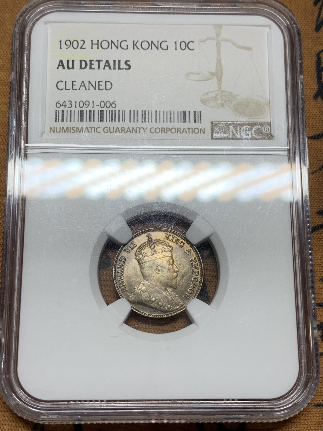 《竞宝斋》第98场-本周日，周一2场连拍（全场不限金额包邮） NGC AU评级 香港 1902年 爱七 10C 1毫银币 细节不错