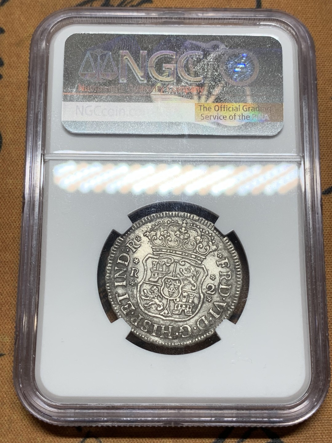 《竞宝斋》第98场-本周日，周一2场连拍（全场不限金额包邮） NGC-UNCD 1756年西属墨西哥地球双柱2R银币 费迪南六世小地球，一般多是XF、AU，UNC品非常少见，这枚细节犀利、打制居中，值得收藏