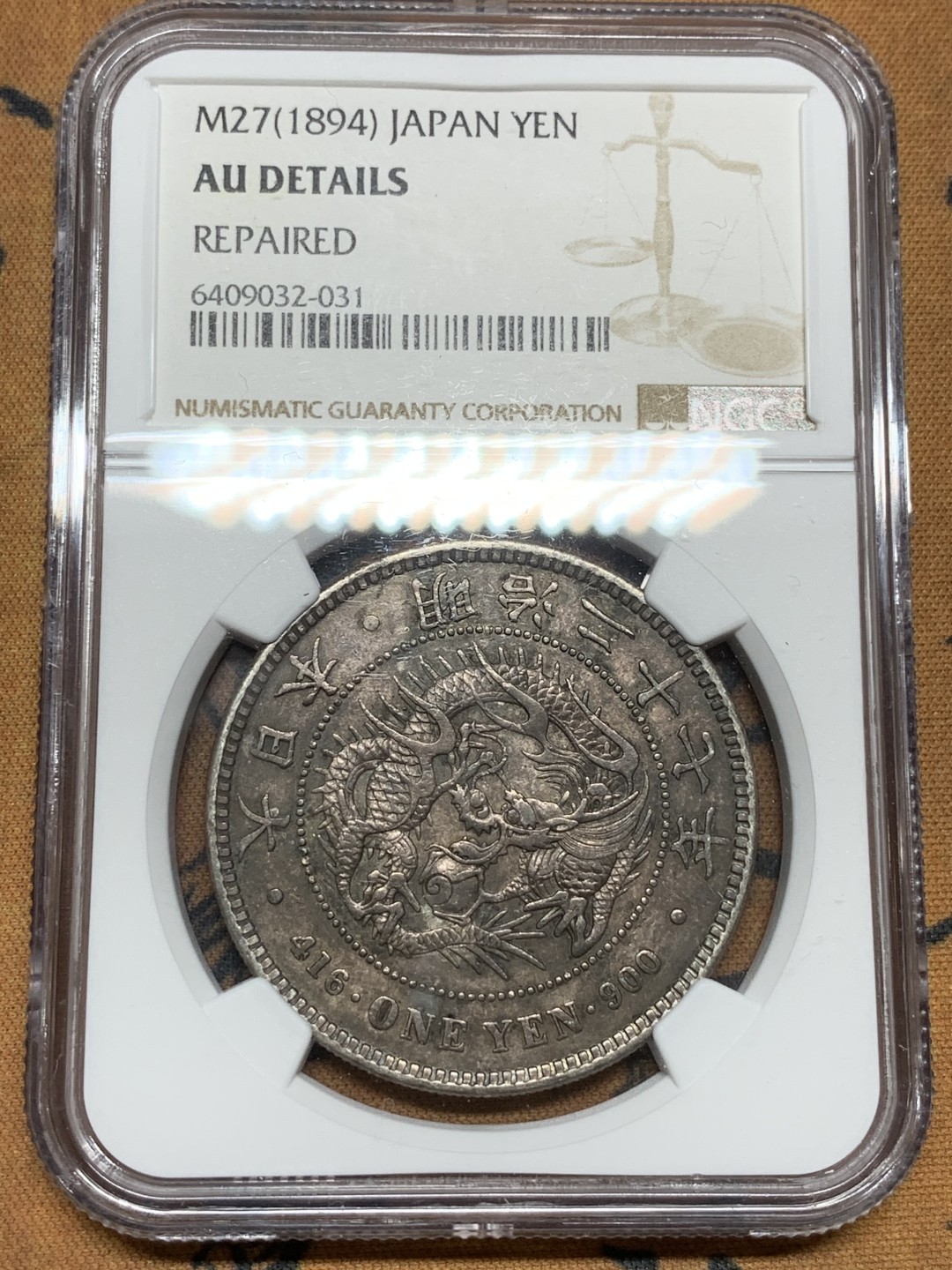《竞宝斋》第98场-本周日，周一2场连拍（全场不限金额包邮） NGC AU评级 日本 1894年 明治二十七年 日龙壹元 银币 深色包浆 细节见图