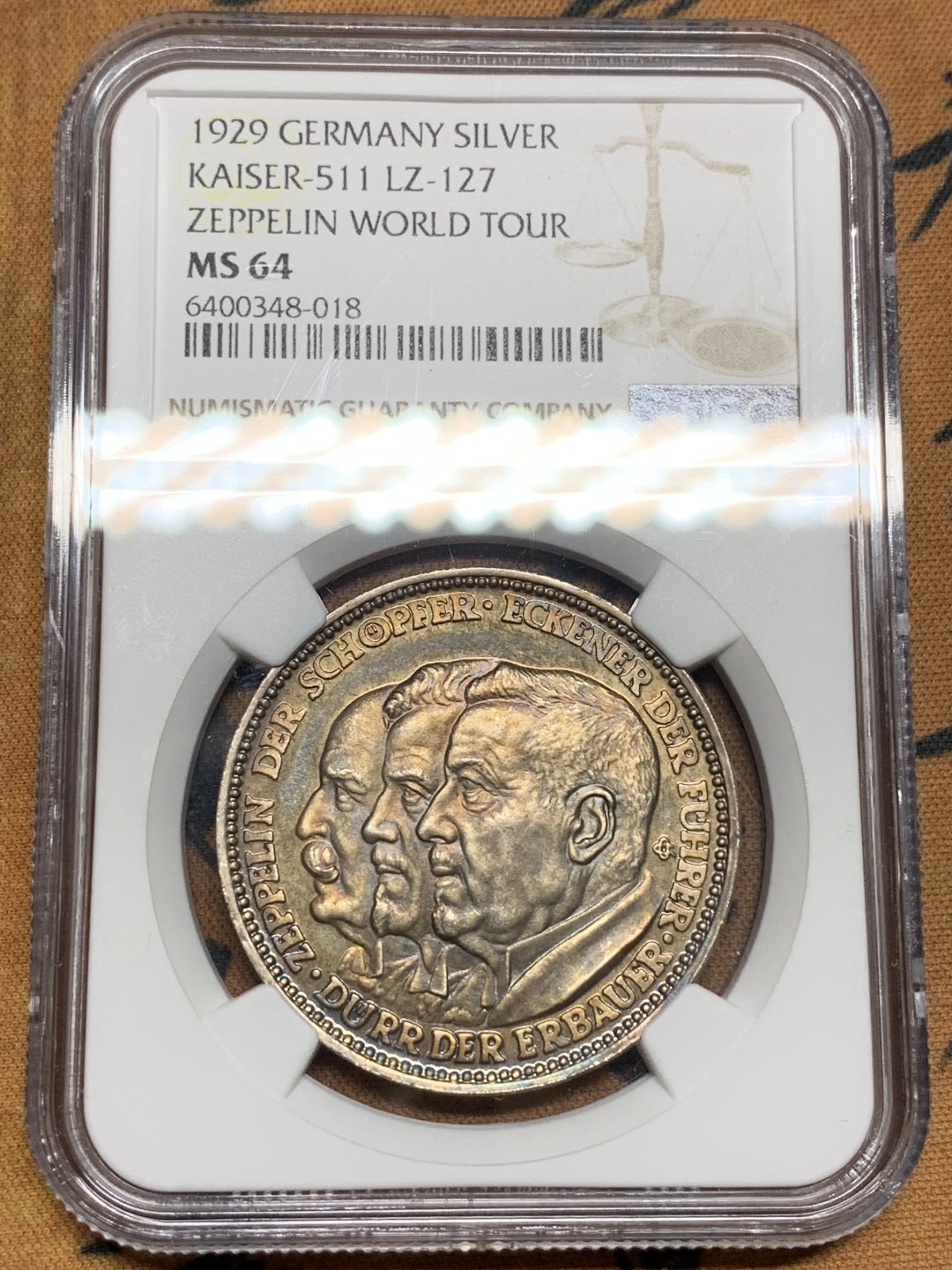 《竞宝斋》第98场-本周日，周一2场连拍（全场不限金额包邮） NGC MS64 1929年德国齐柏林飞艇环球飞行纪念银章 镜面底板 五彩包浆 品相状态完美