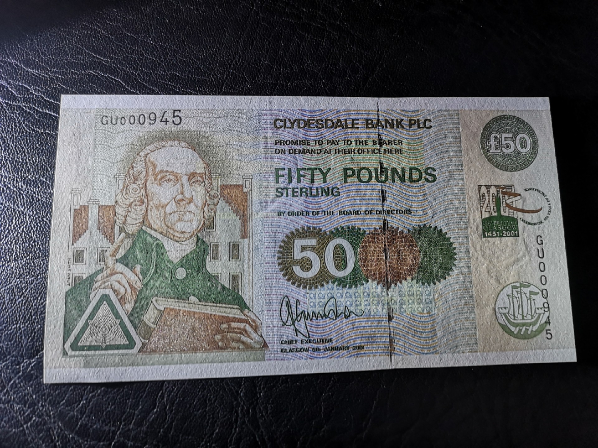 《外钞收藏家》第二百零五期 苏格兰经典专场👍 克莱斯戴尔银行-2001-50镑	GU 000945	P-229C	《格拉斯哥大学成立550周年》	全新UNC