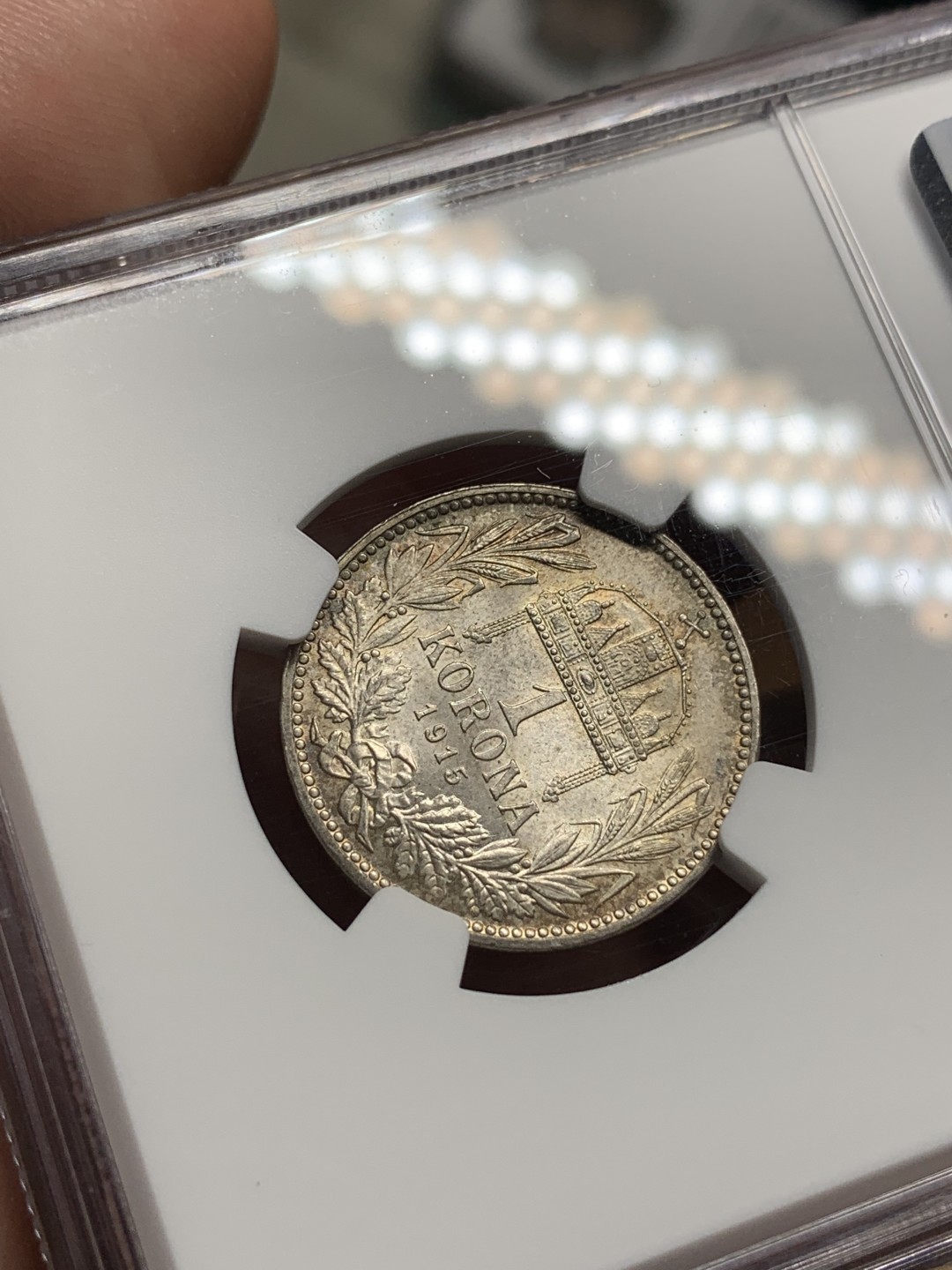 《竞宝斋》第100场-纪念拍卖 (全场包邮)中拍得限量纪念章 NGC MS64 奥匈帝国之后 1915 匈牙利 1克朗银币 双面双色 非常难得 