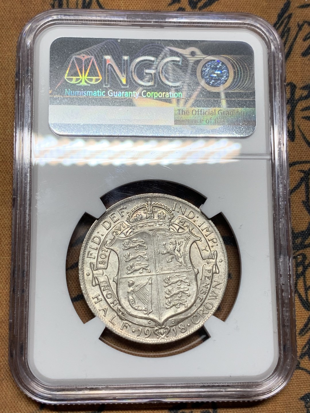 《竞宝斋》第100场-纪念拍卖 (全场包邮)中拍得限量纪念章 NGC AU58 英国 1917年 乔治五世 半克朗 银币 深打底光 这版MS高分的头发也看不清 所以状态很重要