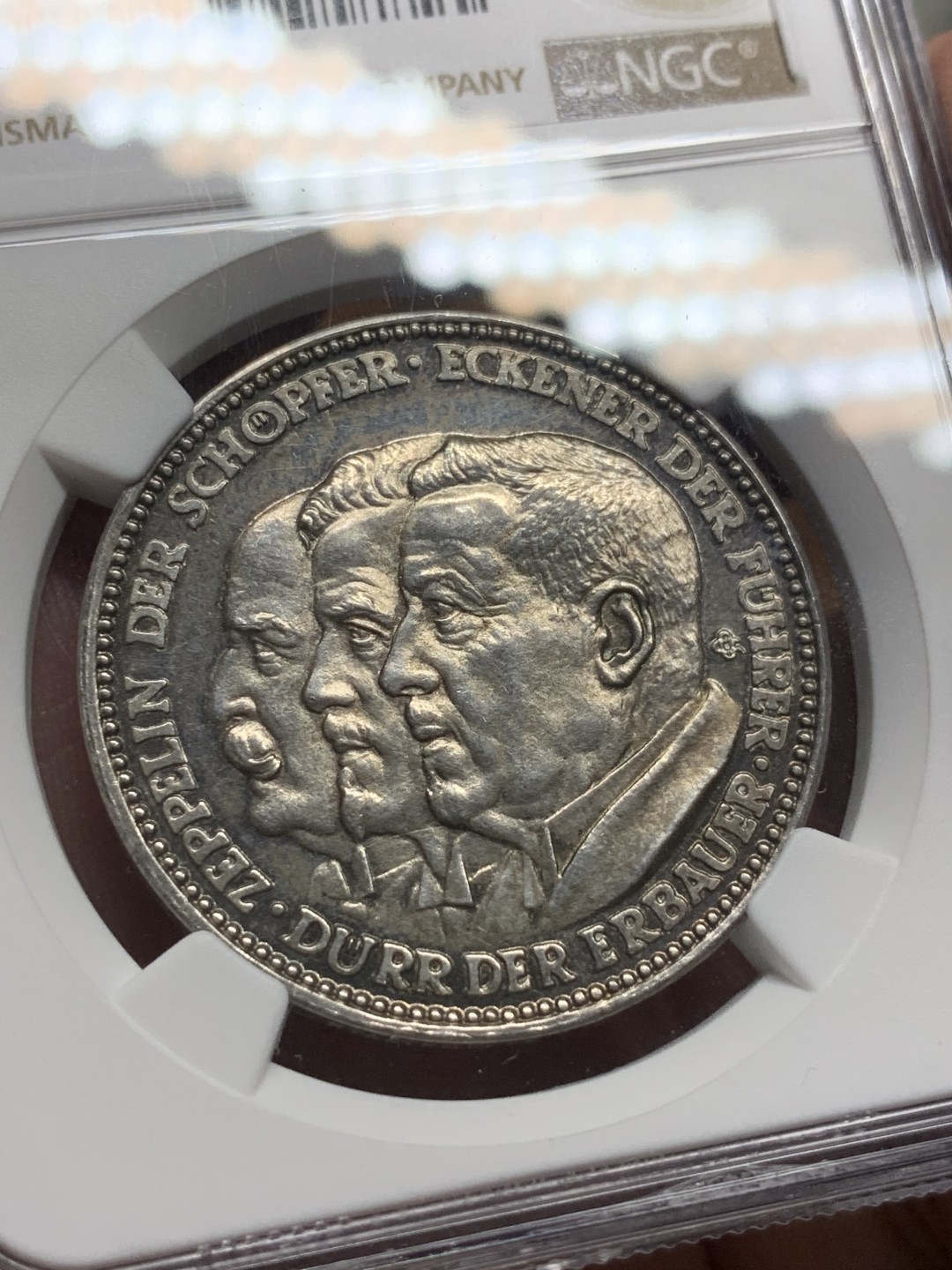 《竞宝斋》第100场-纪念拍卖 (全场包邮)中拍得限量纪念章 NGC UNC 1929年德国齐柏林飞艇环球飞行纪念银章 PL底板 灰度包浆 裸币自评 习惯性没分