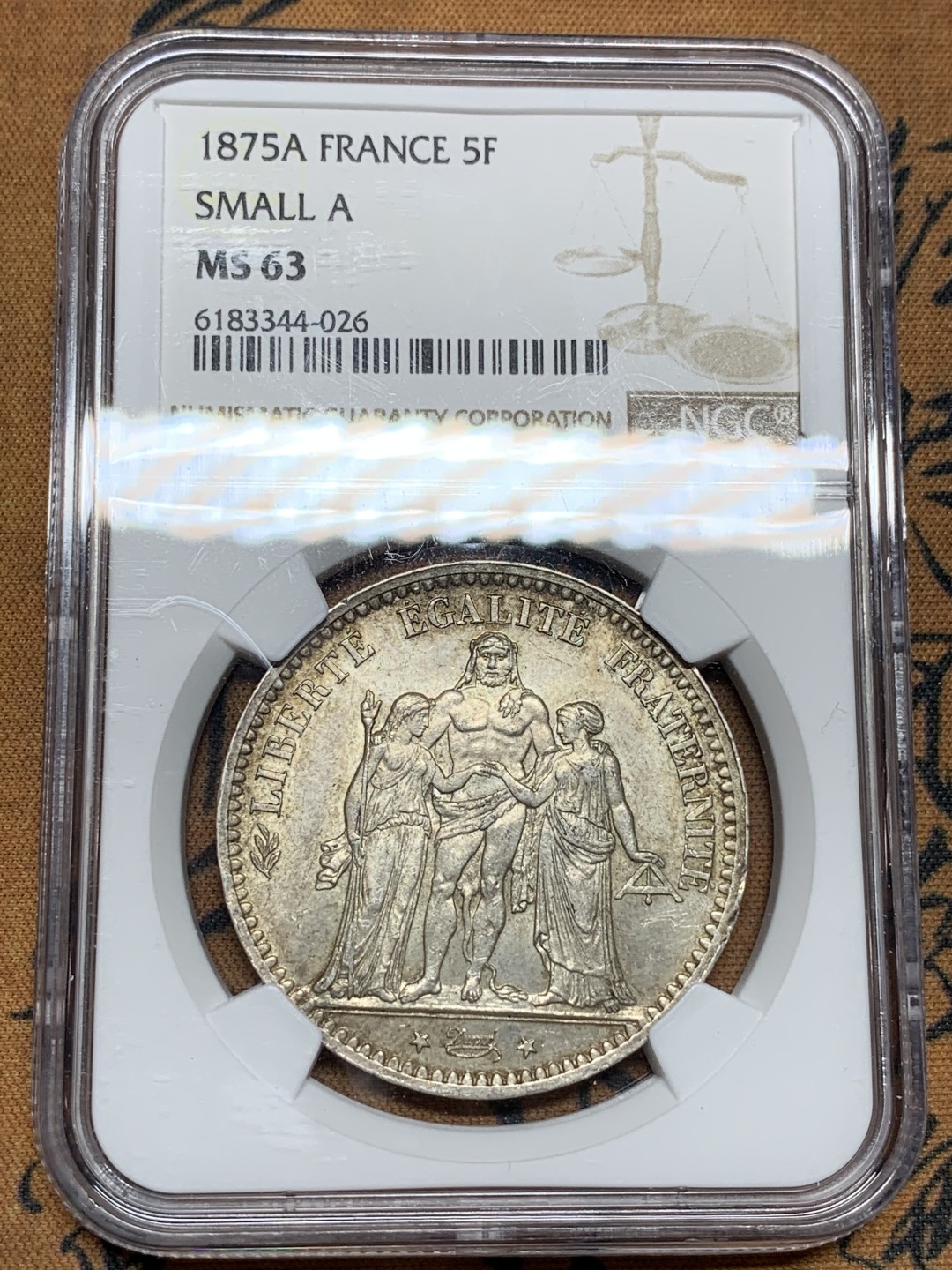 《竞宝斋》第100场-纪念拍卖 (全场包邮)中拍得限量纪念章 NGC MS63 法国 1875年 小A版  大力神5法郎银币 细节好 带转光  数量不及1873的十分之一