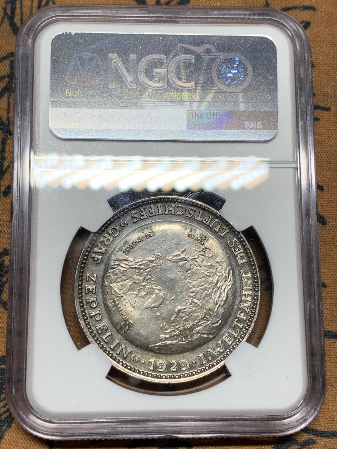 《竞宝斋》第100场-纪念拍卖 (全场包邮)中拍得限量纪念章 NGC UNC 1929年德国齐柏林飞艇环球飞行纪念银章 PL底板 灰度包浆 裸币自评 习惯性没分