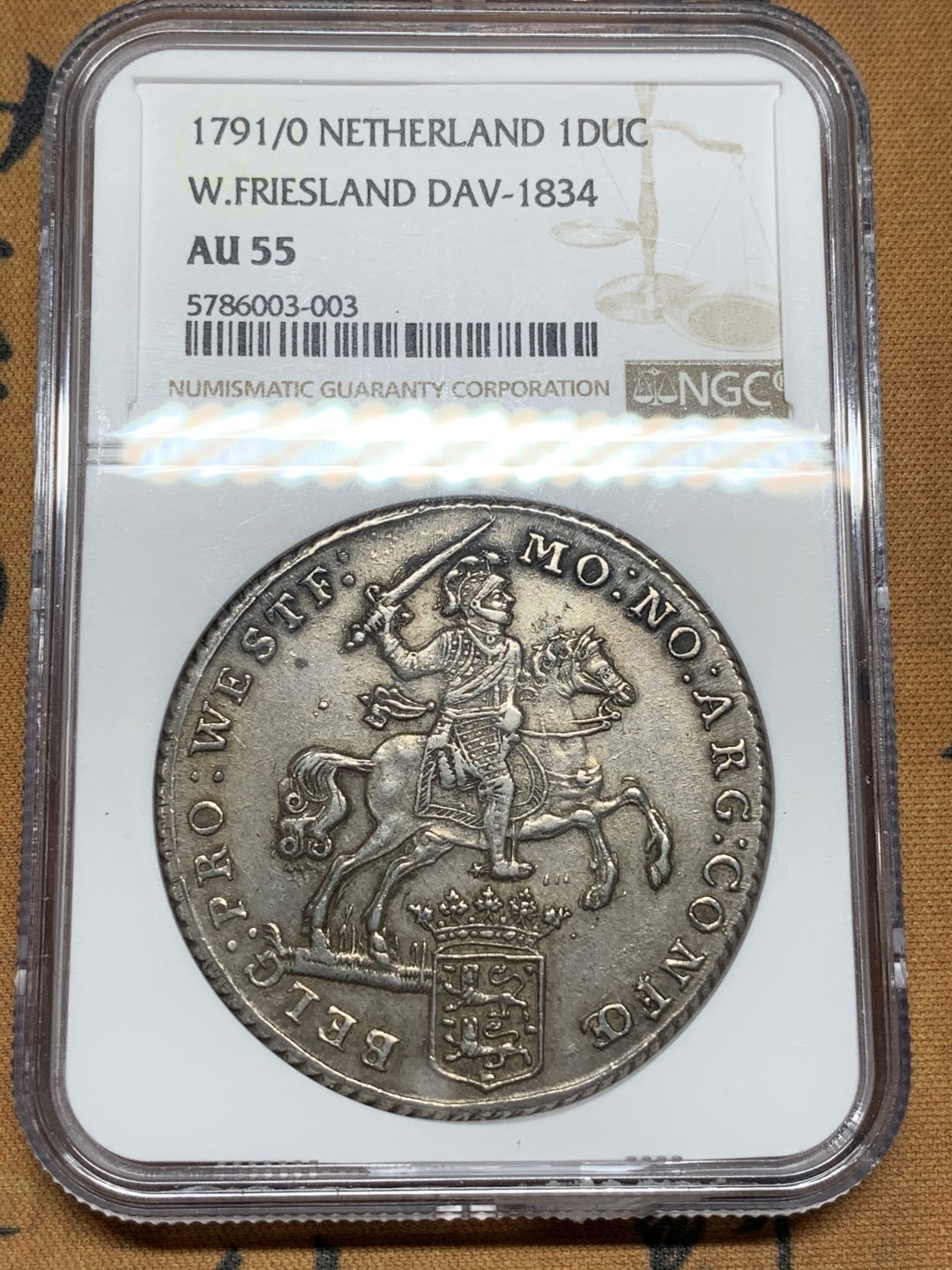 《竞宝斋》第100场-纪念拍卖 (全场包邮)中拍得限量纪念章 更高分3枚  NGC AU55 荷兰 骑字版 1791/0年 西弗里斯兰省 1杜卡特大马剑银币 原味包浆 双面深打 状态难得