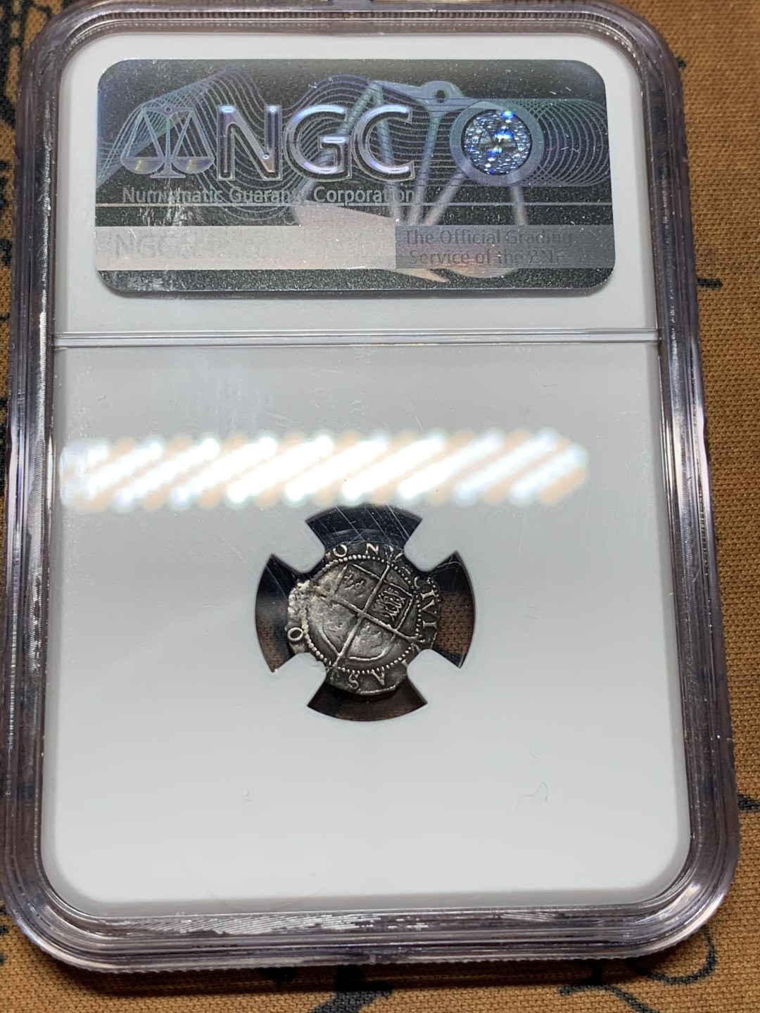 《竞宝斋》第100场-纪念拍卖 (全场包邮)中拍得限量纪念章 NGC VF 英国 1600年 伊丽莎白一世 1便士银币 这枚人像清晰 打制非常好 评级师用现代币的标准定义1600年的币 不理解