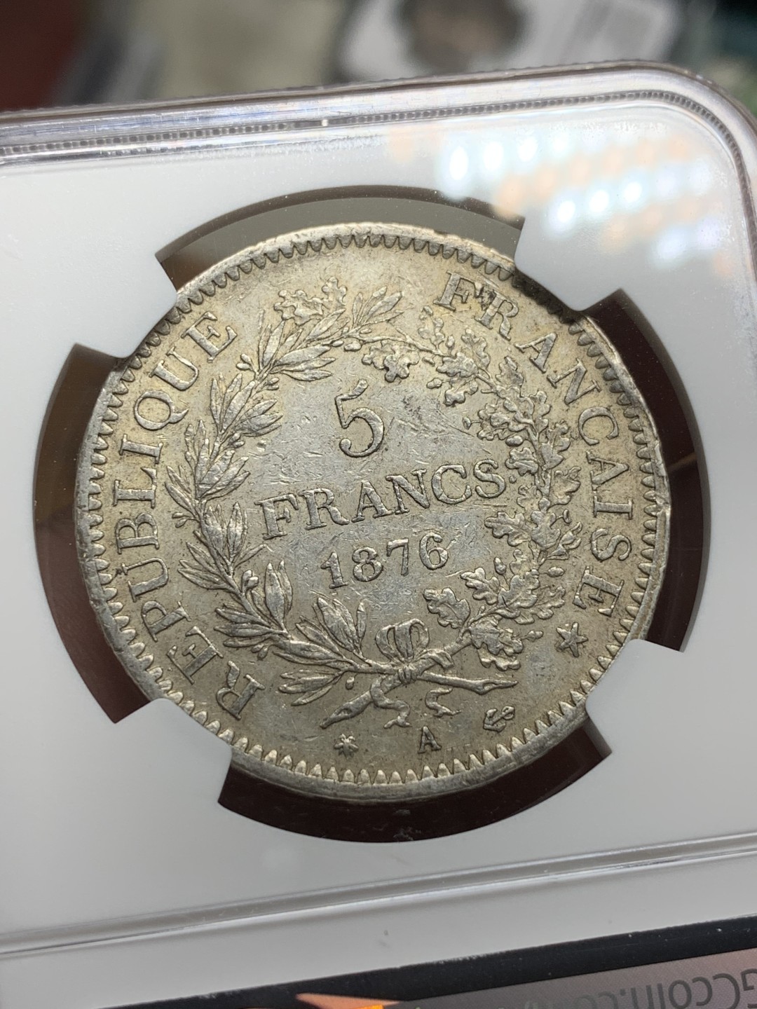 《竞宝斋》第100场-纪念拍卖 (全场包邮)中拍得限量纪念章 NGC AU55 法国 1876年 大力神5法郎银币 比较少的年份 状态不错