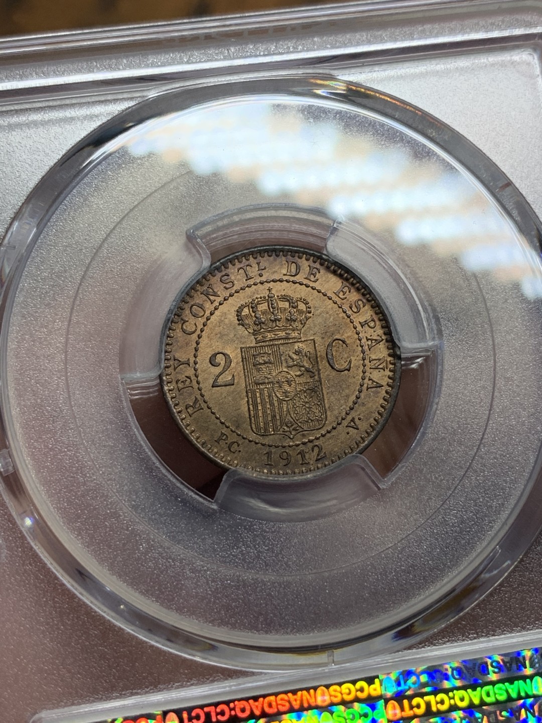 《竞宝斋》第100场-纪念拍卖 (全场包邮)中拍得限量纪念章 PCGS MS64RB 西班牙 1912年 阿方索十三世 2C 铜币 这个头像的高分不多 早年自己送评的 评级费就150了