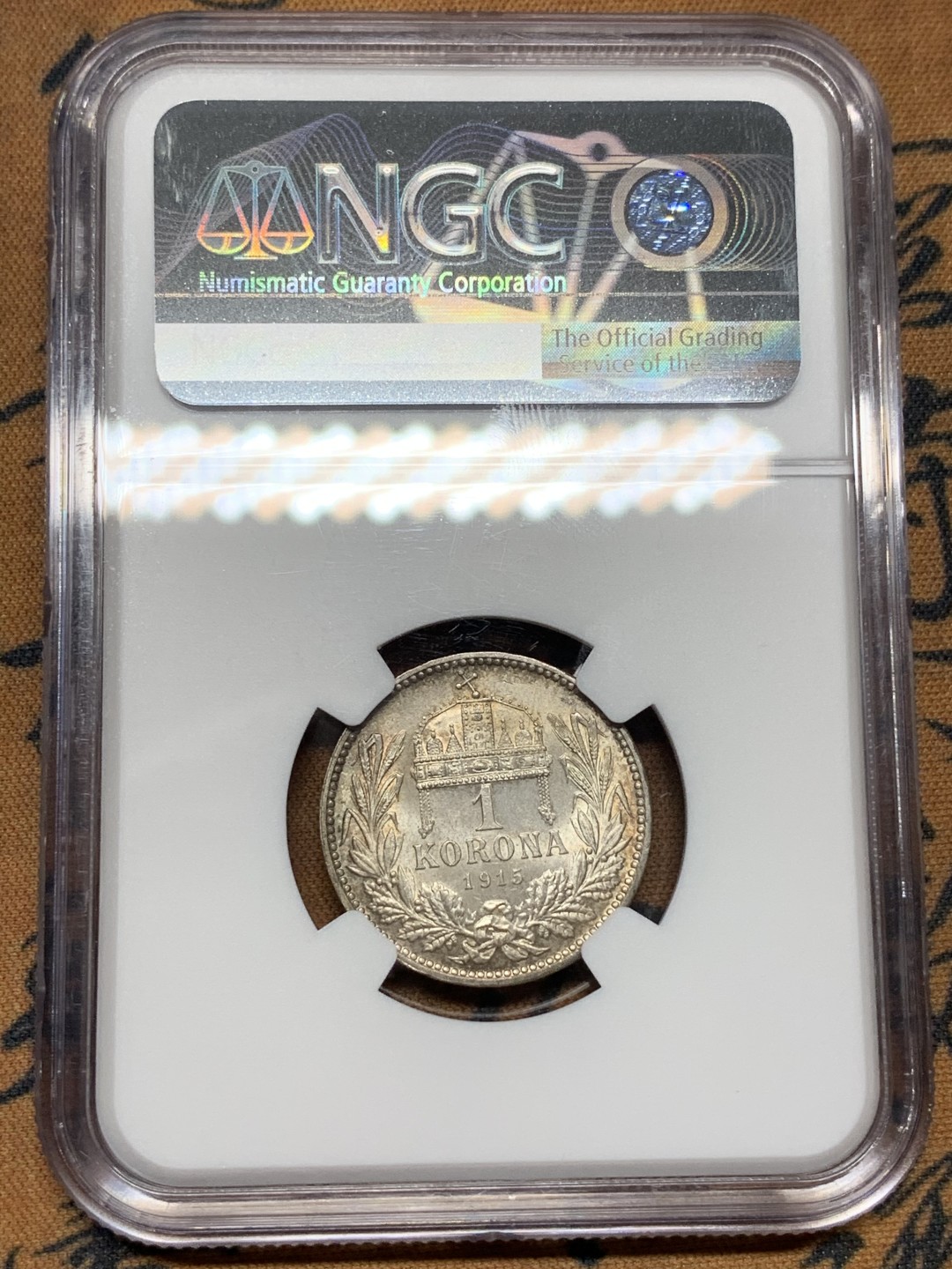 《竞宝斋》第100场-纪念拍卖 (全场包邮)中拍得限量纪念章 NGC MS64 奥匈帝国之后 1915 匈牙利 1克朗银币 双面双色 非常难得 