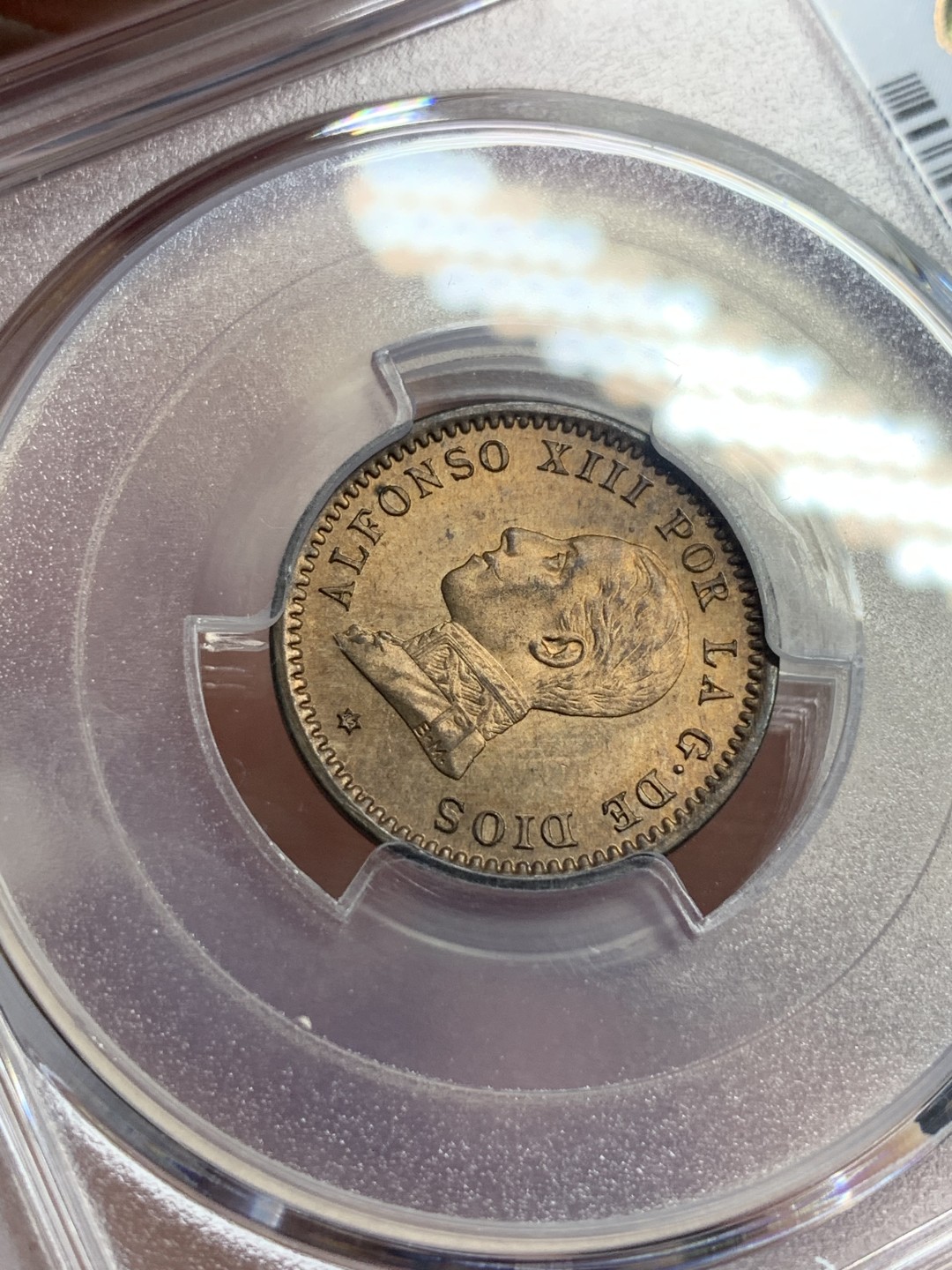 《竞宝斋》第100场-纪念拍卖 (全场包邮)中拍得限量纪念章 PCGS MS64RB 西班牙 1912年 阿方索十三世 2C 铜币 这个头像的高分不多 早年自己送评的 评级费就150了