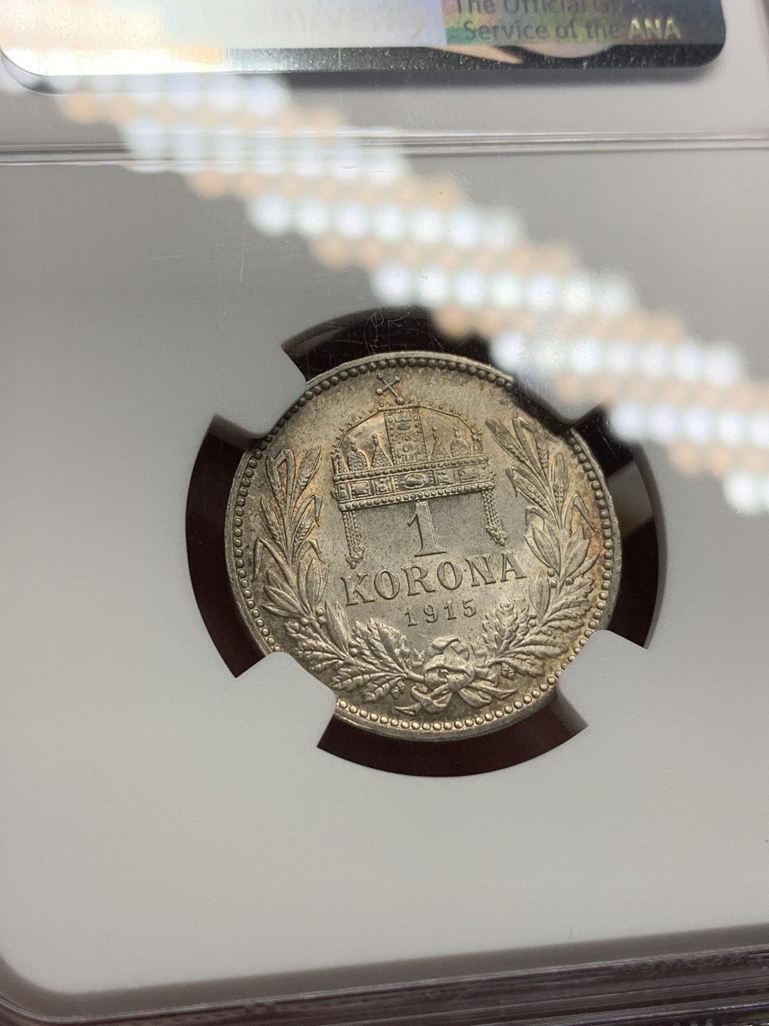 《竞宝斋》第100场-纪念拍卖 (全场包邮)中拍得限量纪念章 NGC MS64 奥匈帝国之后 1915 匈牙利 1克朗银币 双面双色 非常难得 