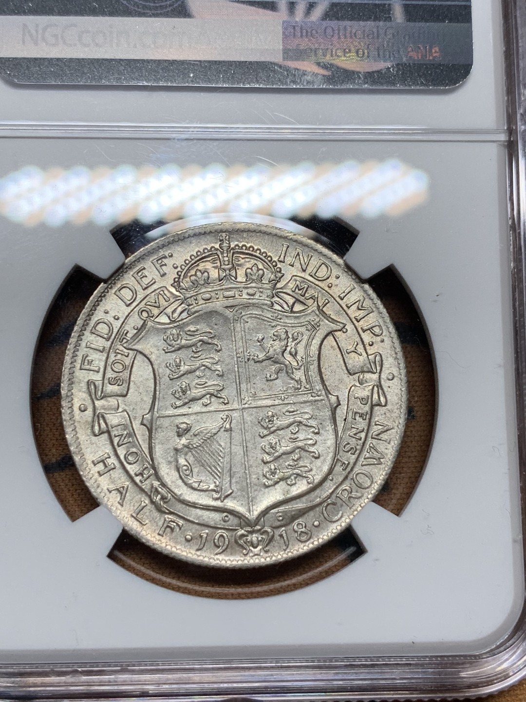 《竞宝斋》第100场-纪念拍卖 (全场包邮)中拍得限量纪念章 NGC AU58 英国 1917年 乔治五世 半克朗 银币 深打底光 这版MS高分的头发也看不清 所以状态很重要