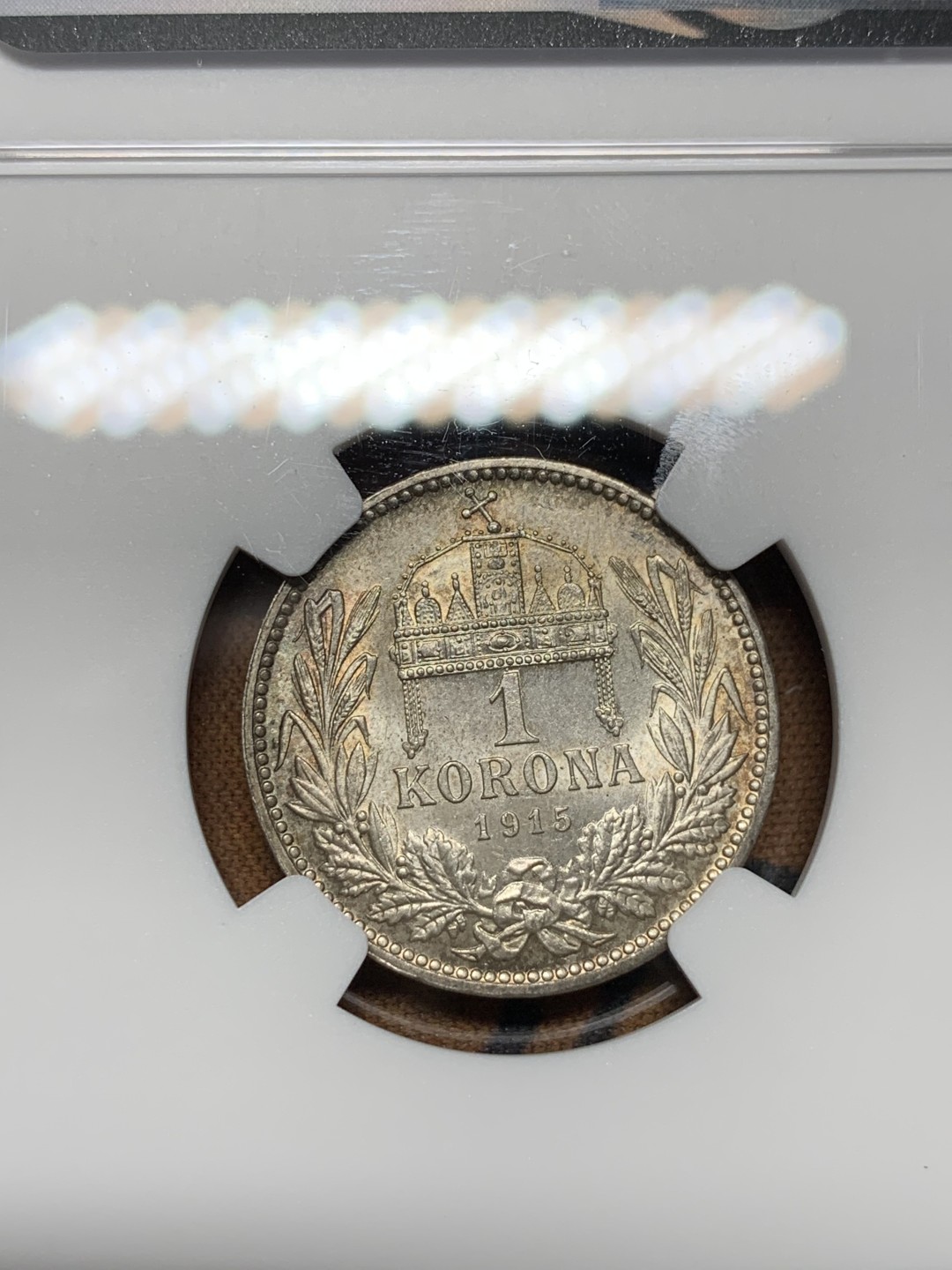 《竞宝斋》第100场-纪念拍卖 (全场包邮)中拍得限量纪念章 NGC MS64 奥匈帝国之后 1915 匈牙利 1克朗银币 双面双色 非常难得 