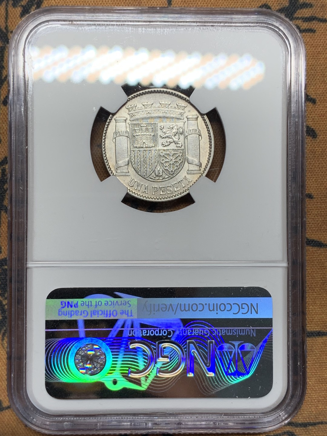 《竞宝斋》第100场-纪念拍卖 (全场包邮)中拍得限量纪念章 NGC AU 评级 西班牙 1933年 内战1比塞塔 银币 战时损耗不小 这个细节不错