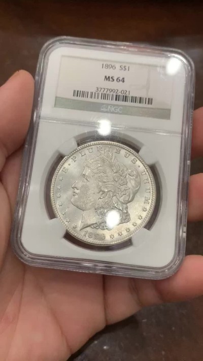 《竞宝斋》第100场-纪念拍卖 (全场包邮)中拍得限量纪念章 NGC MS64 美国 1896年 摩根银元 整体不错 也是比较好的年份  可收藏