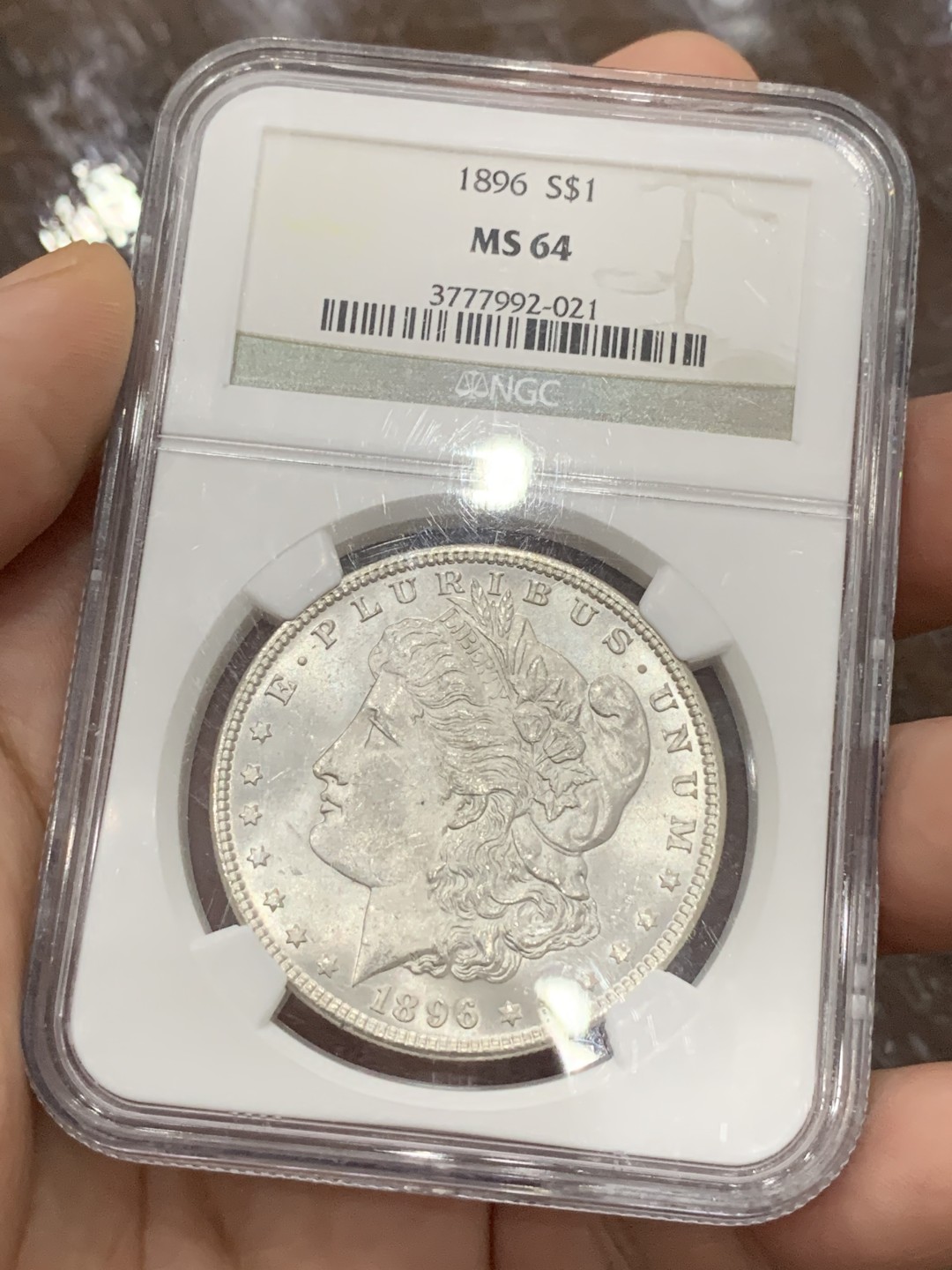 《竞宝斋》第100场-纪念拍卖 (全场包邮)中拍得限量纪念章 NGC MS64 美国 1896年 摩根银元 整体不错 也是比较好的年份  可收藏