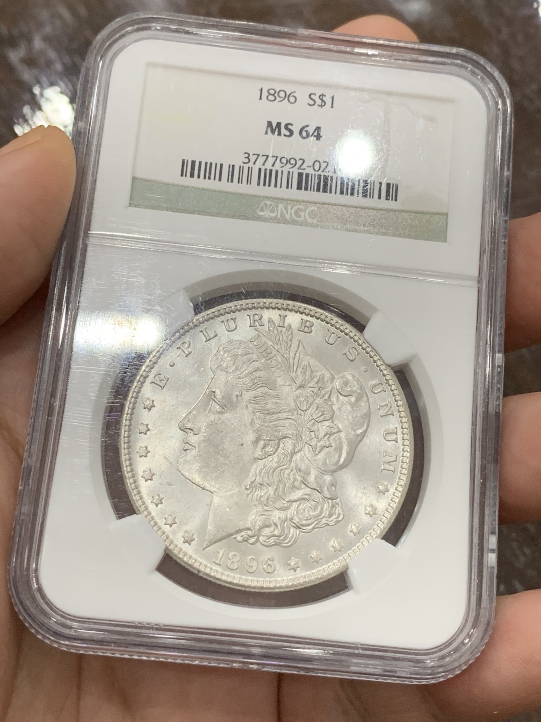 《竞宝斋》第100场-纪念拍卖 (全场包邮)中拍得限量纪念章 NGC MS64 美国 1896年 摩根银元 整体不错 也是比较好的年份  可收藏