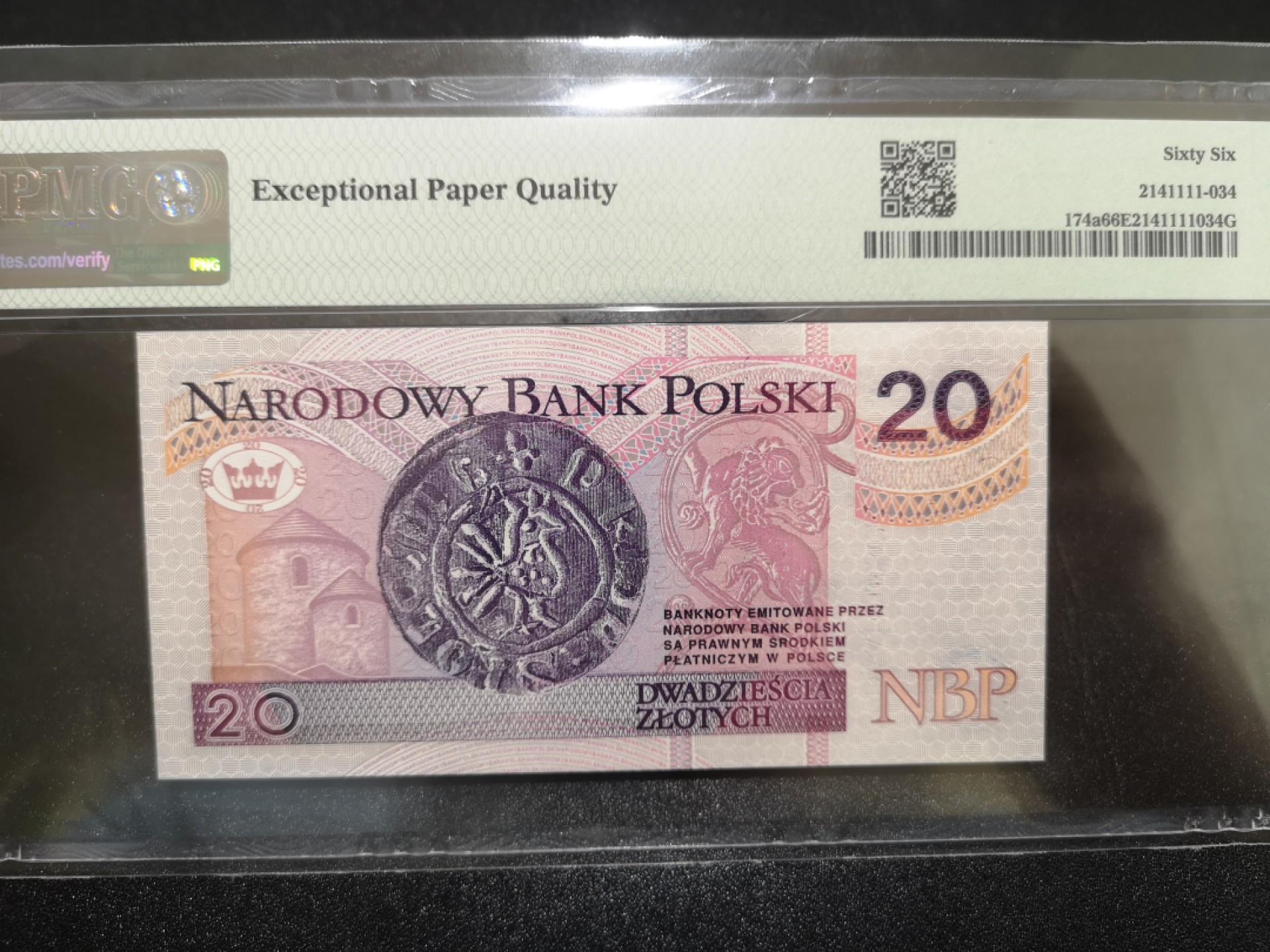 《外钞收藏家》第二百零六期 1994年波兰20 AA冠 PMG66 无47尾8