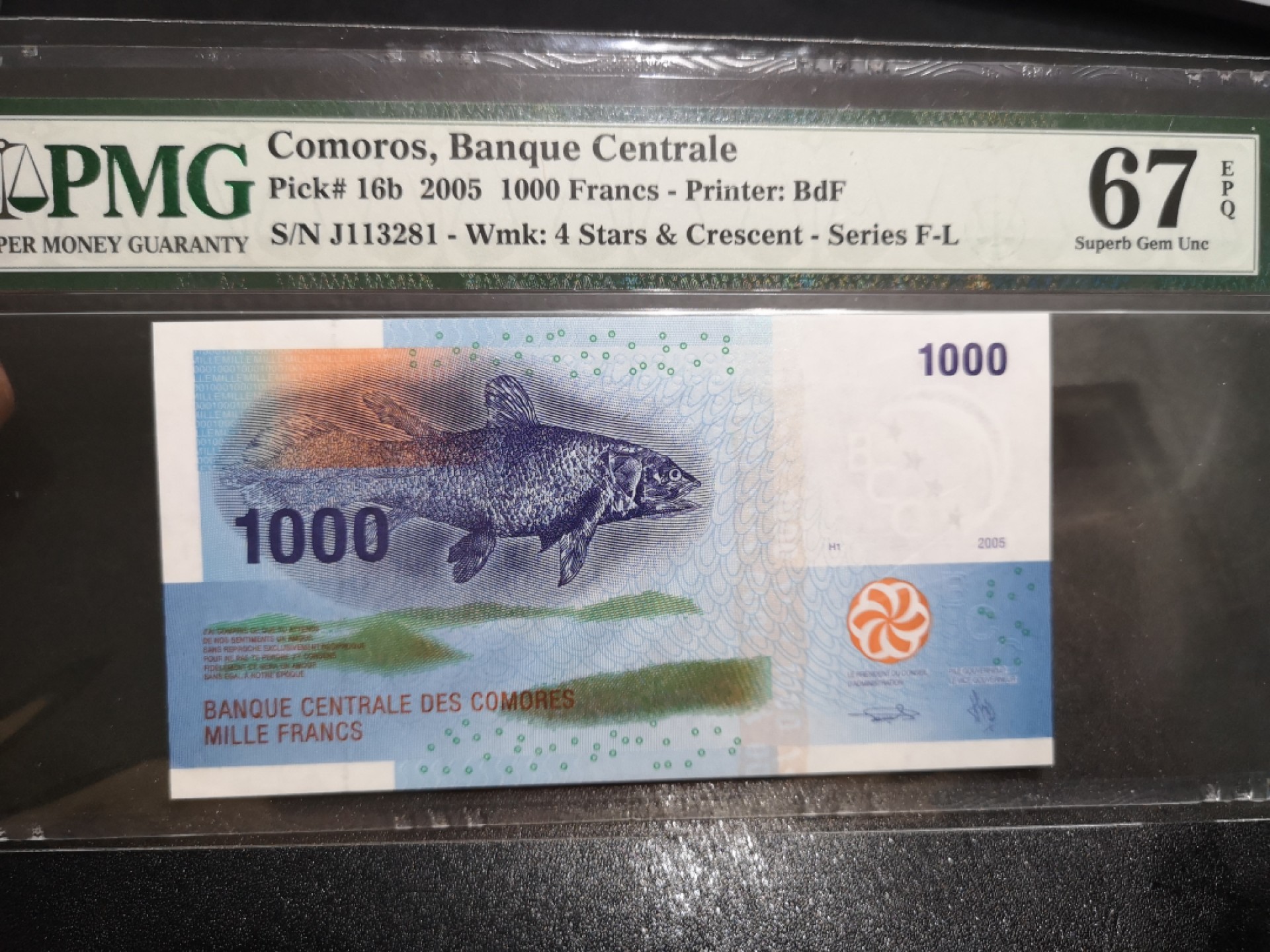 《外钞收藏家》第二百零六期 2005年科摩罗1000 PMG67 无47
