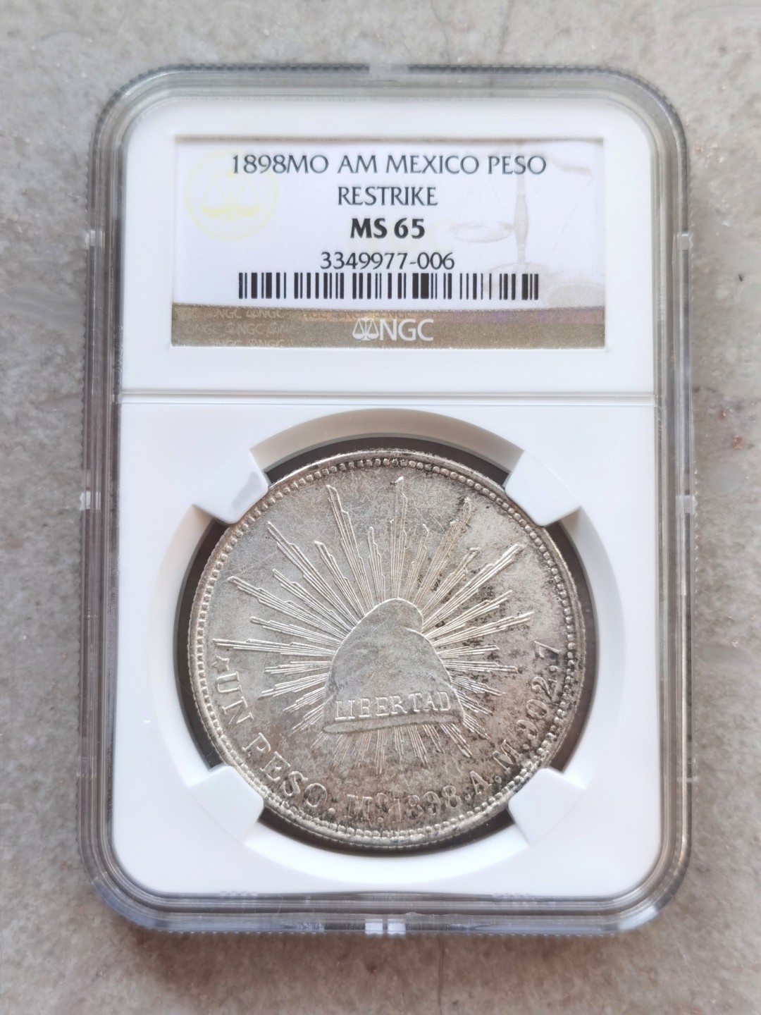 博洋堂世界钱币拍卖第001期（全场包邮） NGC MS65 1898年墨西哥Mo AM版直边鹰洋（Restrike），原卷暴光带彩