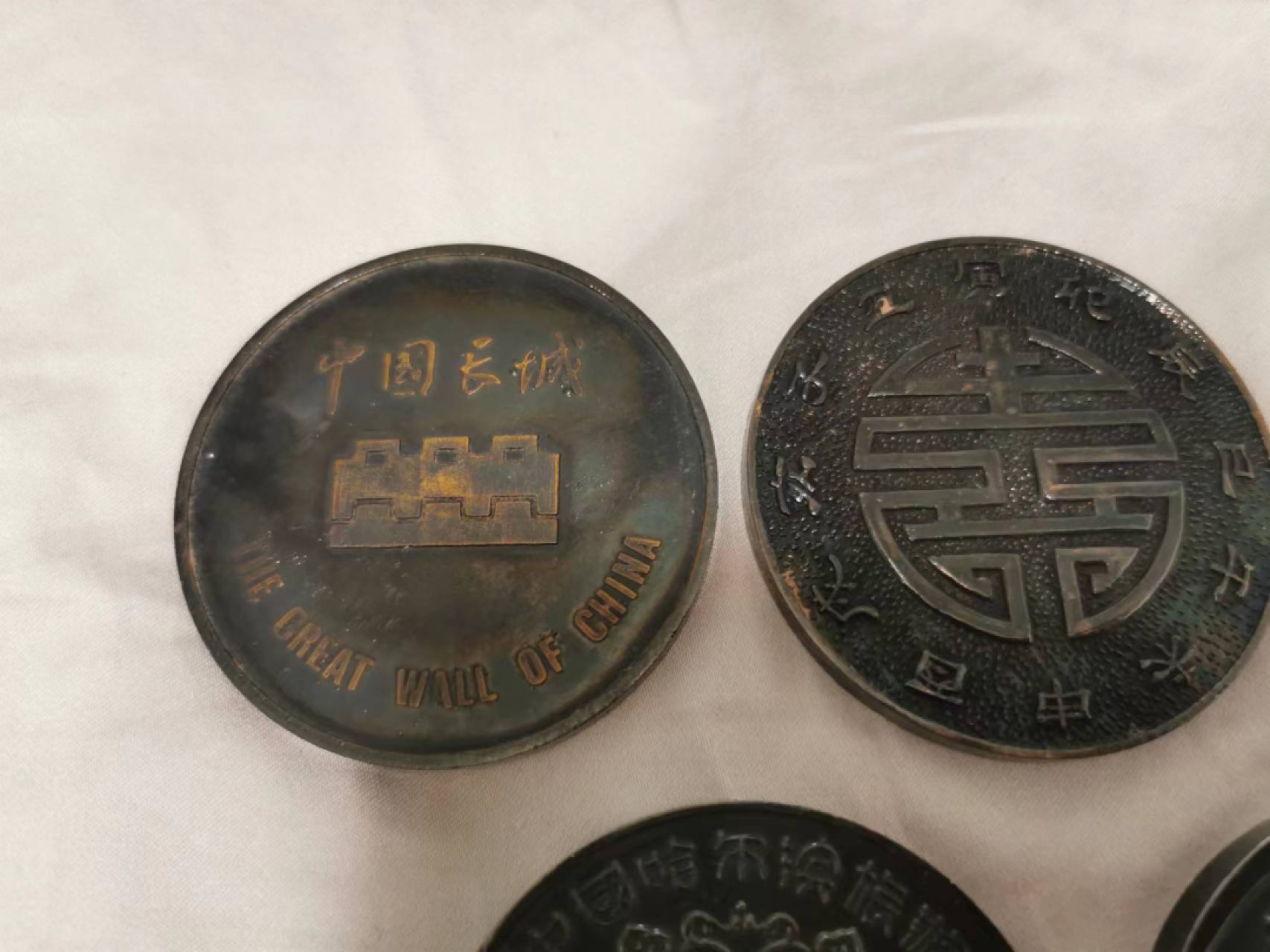 27.【鲸贝乐★道德经】第“圣人不仁，以百姓为刍狗”号拍卖 【旅游景点大铜章一组5个】5个品种品相如图，景点旅游大铜章，精美藏品