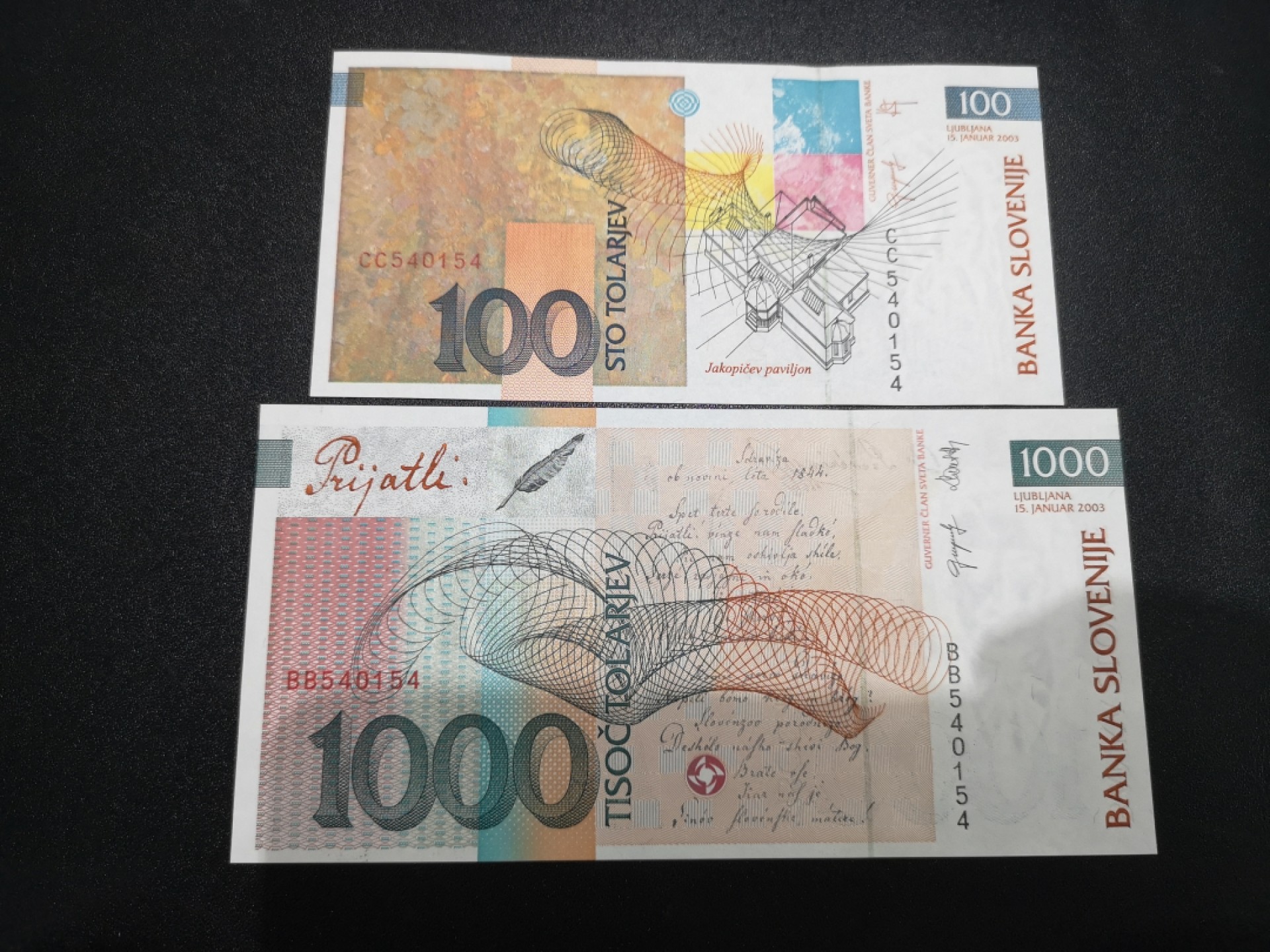 《外钞收藏家》第二百零七期（东欧三国裸钞专场） 斯洛文尼亚-2004-100和1000托拉尔 入欧纪念钞 同号两张